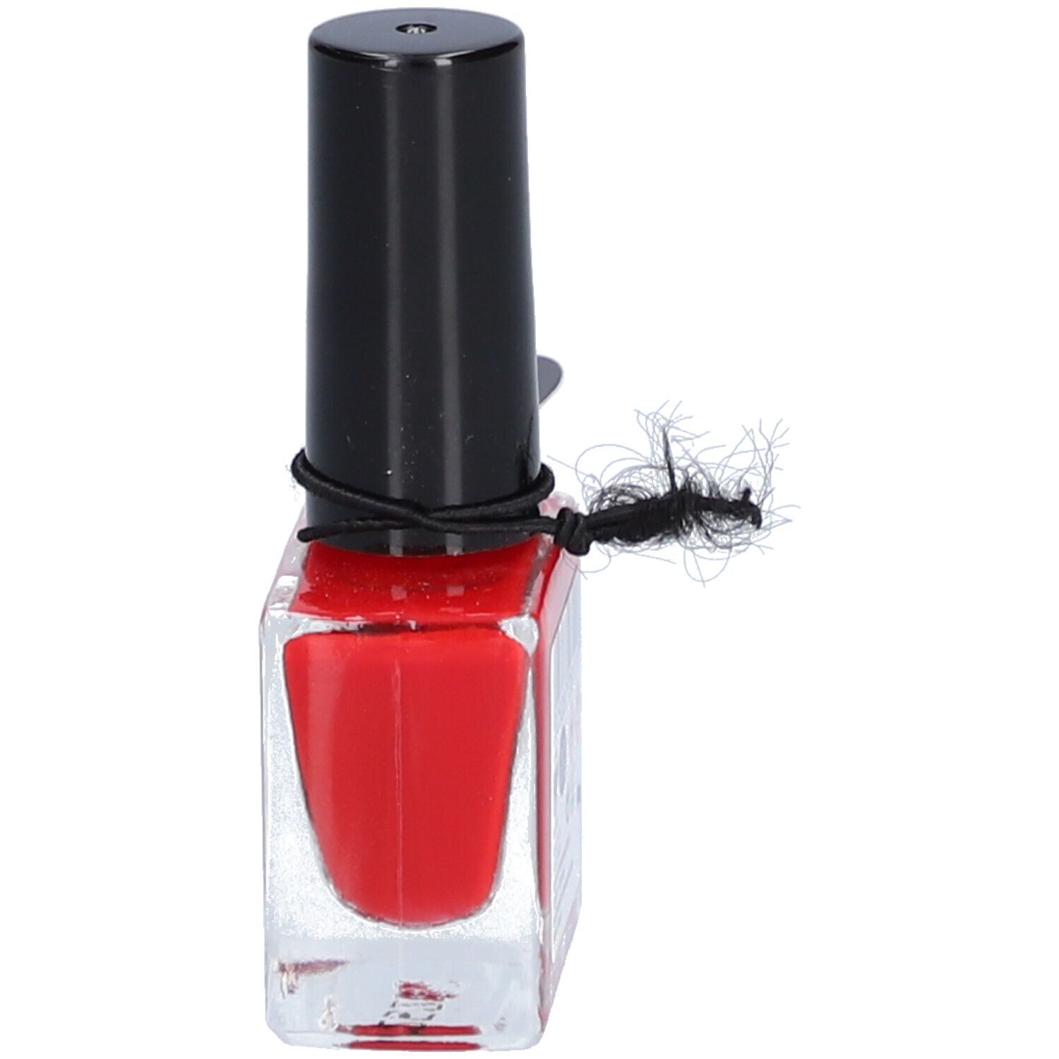 Flacon de vernis à ongles rouge avec bouchon noir. Bande élastique noire. Inscription illisible.