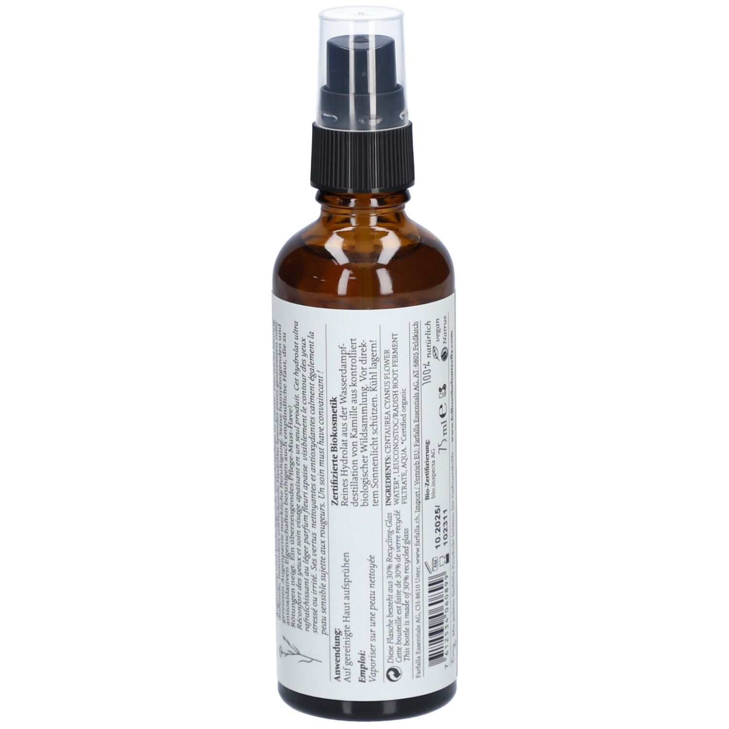 Braune Glasflasche mit Zerstäuber. Etikett mit Inhaltsstoffen, Anwendungshinweisen und Informationen. Text in mehreren Sprachen.