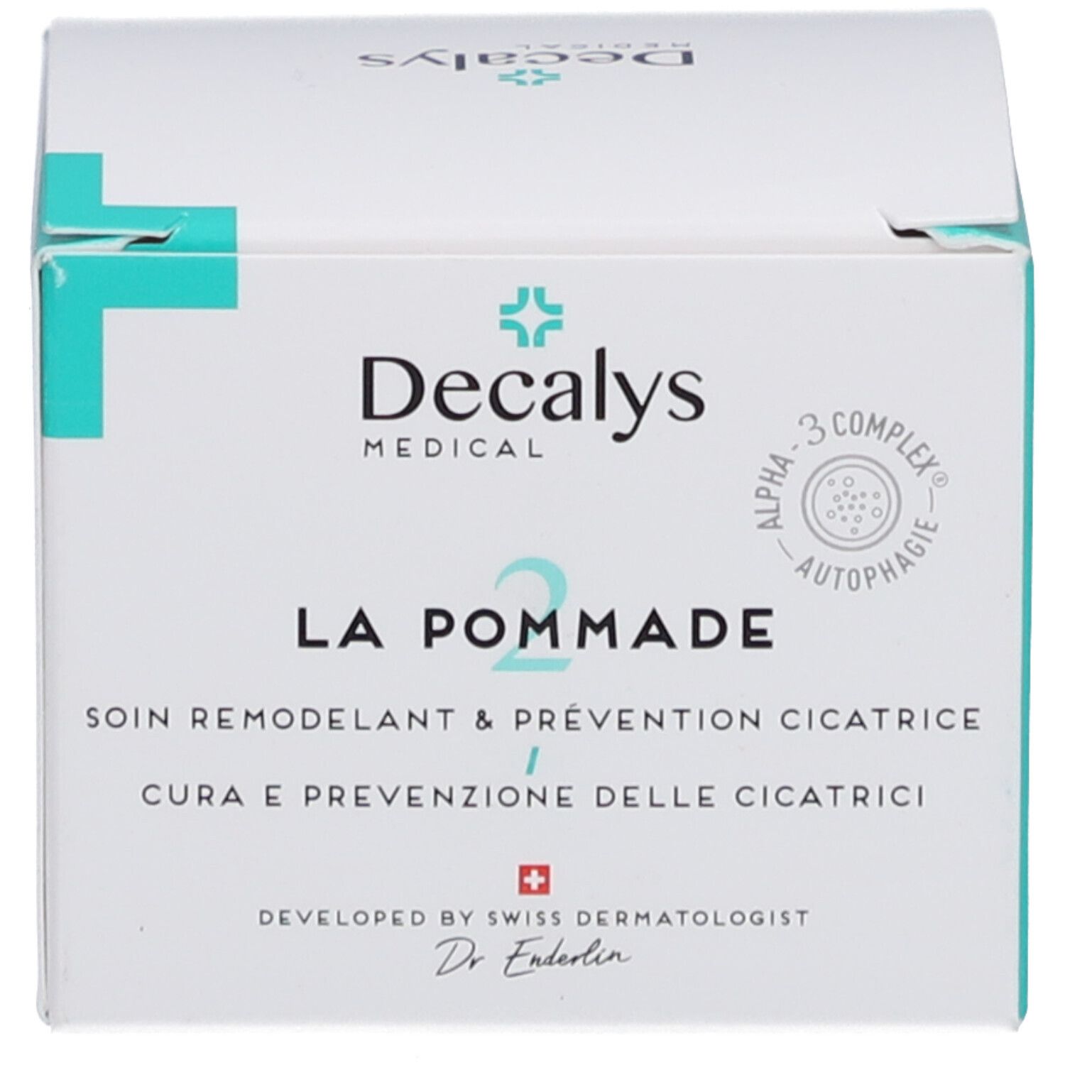 Produktverpackung. Aufschrift: Decalys Medical, La Pommade, Alpha-3 Complex, Schweizer Kreuz.