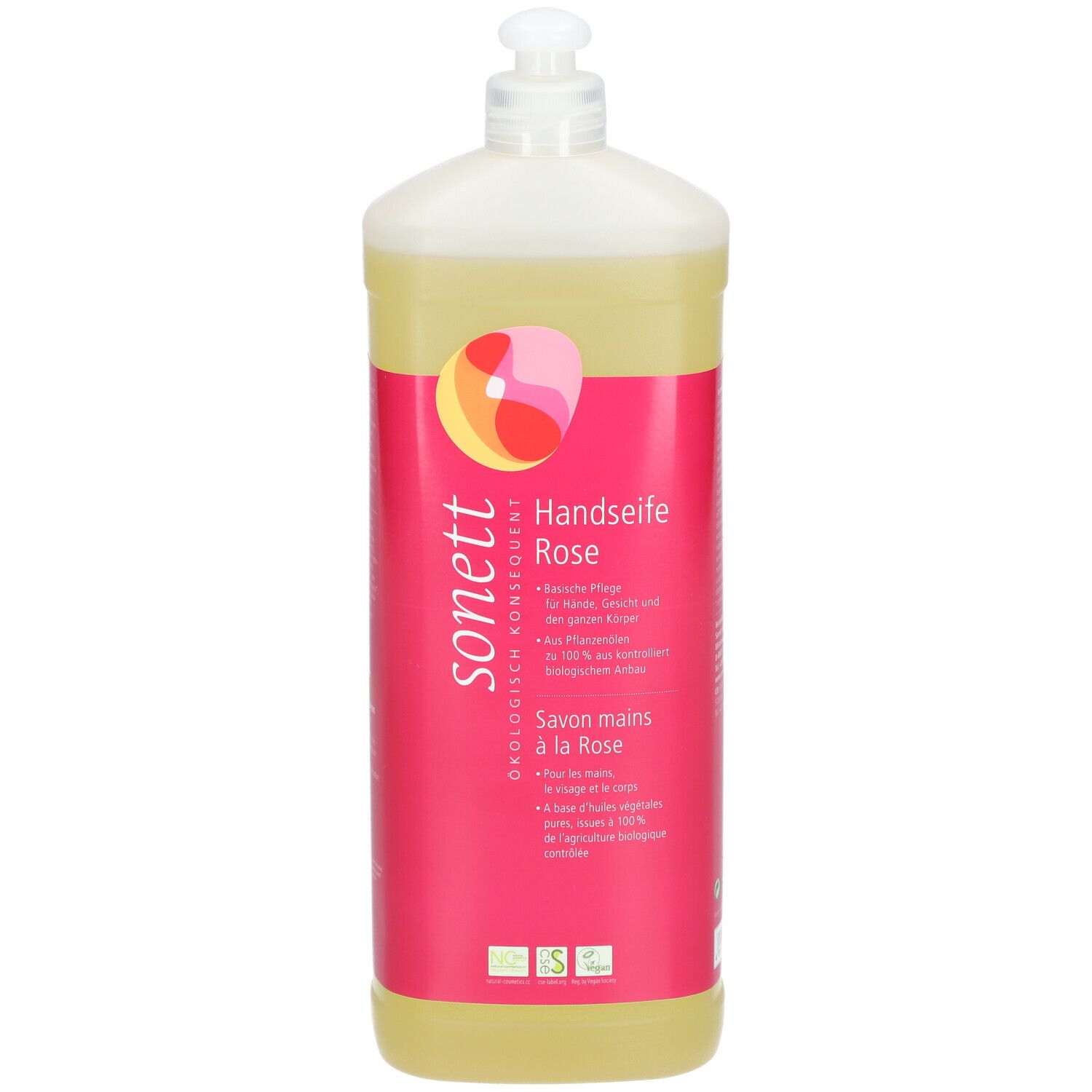Flacon de savon liquide à la rose. Étiquette rose avec logo et nom du produit. Liquide transparent.