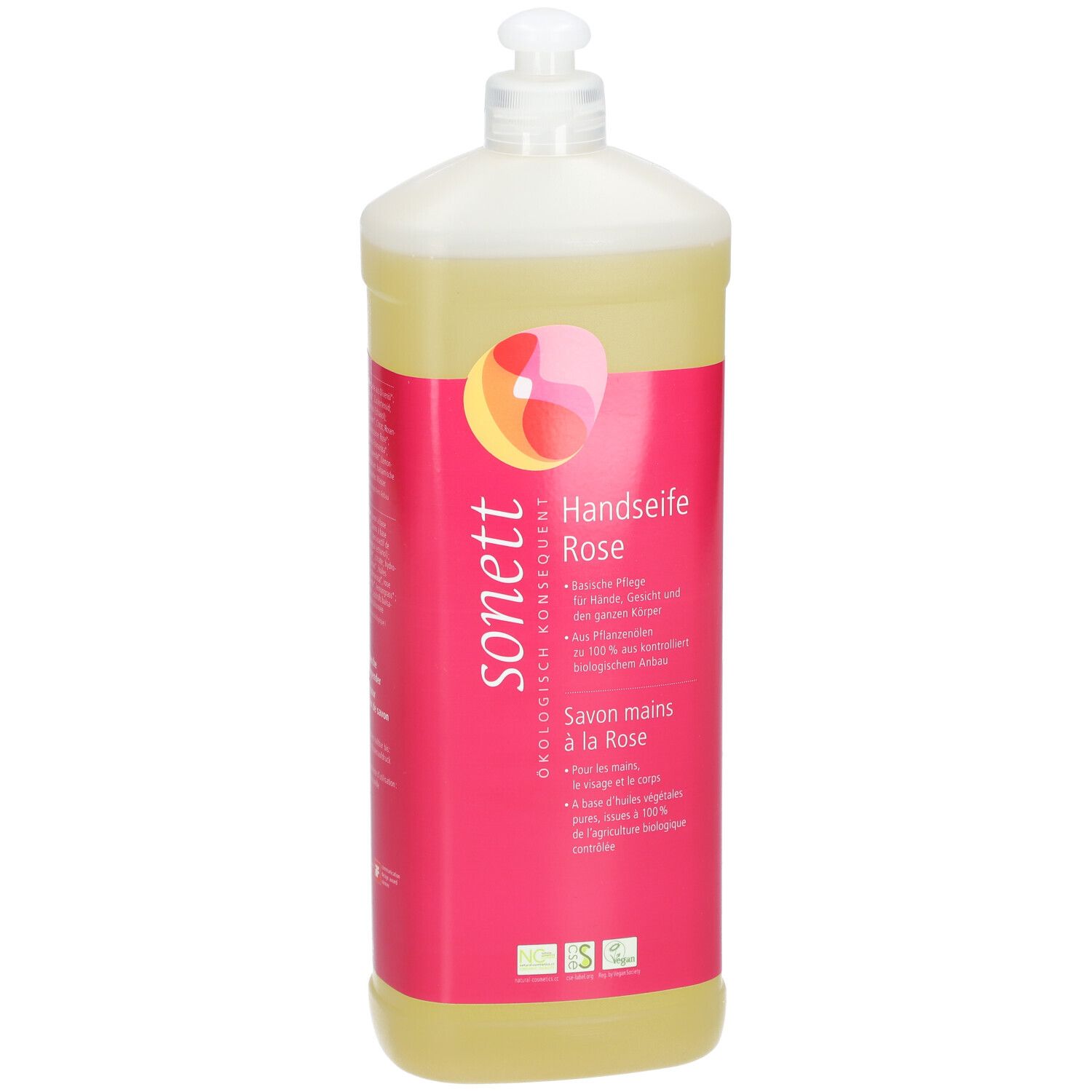 Flacon de savon liquide à la rose. Étiquette rose avec logo et nom du produit. Liquide transparent.