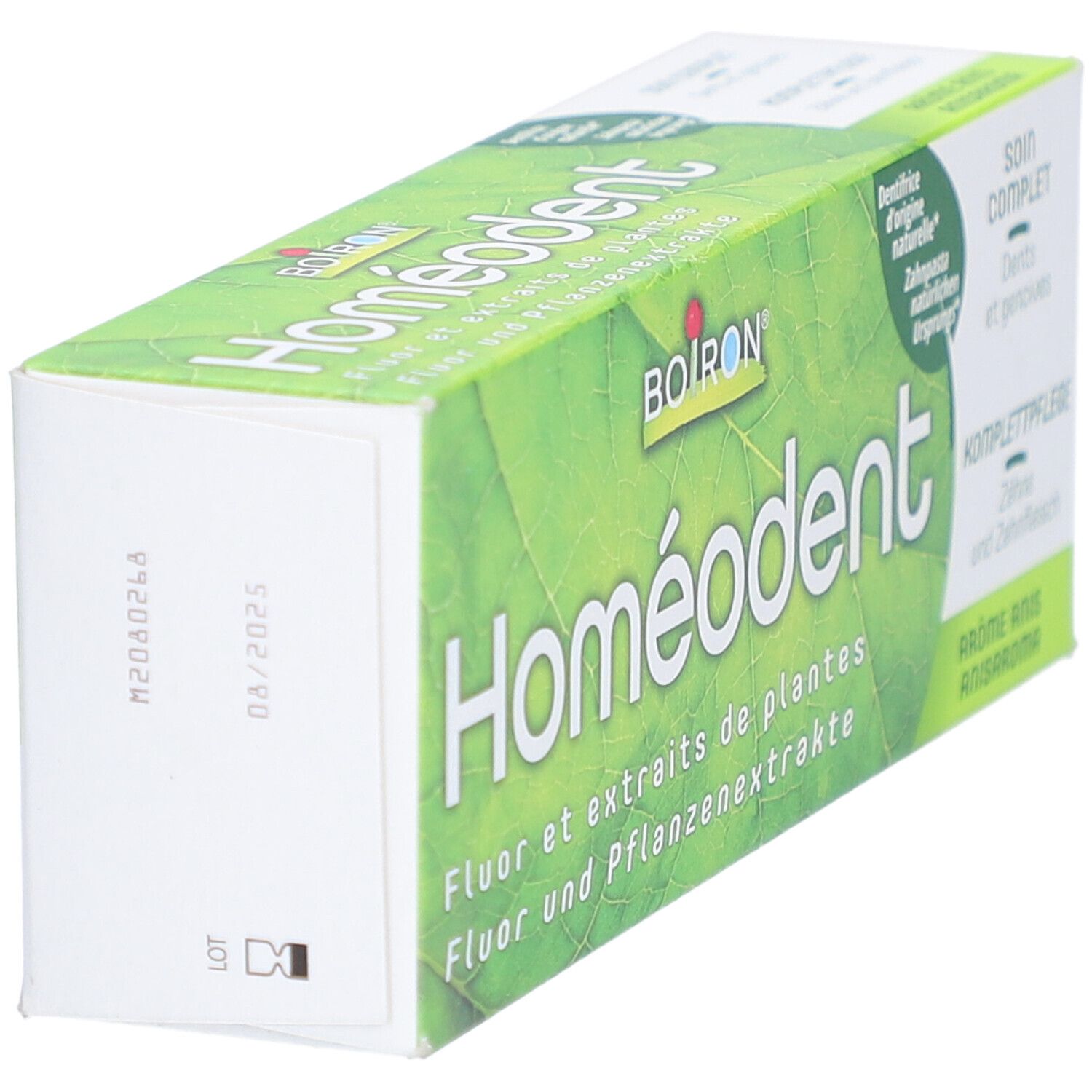 Homeodent Zahnpasta-Schachtel, grüne Farbe. Aufschrift: Fluor und Pflanzenextrakte. Marke: Boiron.