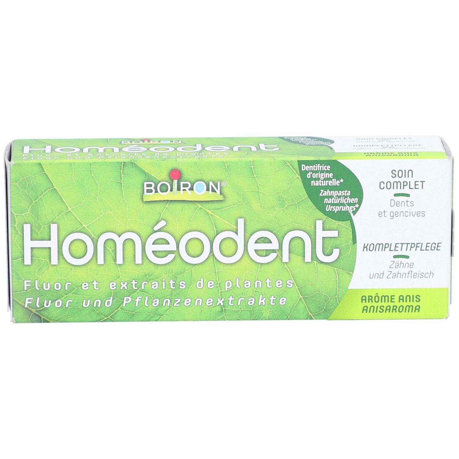 Homeodent Zahnpasta-Schachtel, grüne Farbe. Aufschrift: Fluor und Pflanzenextrakte. Marke: Boiron.
