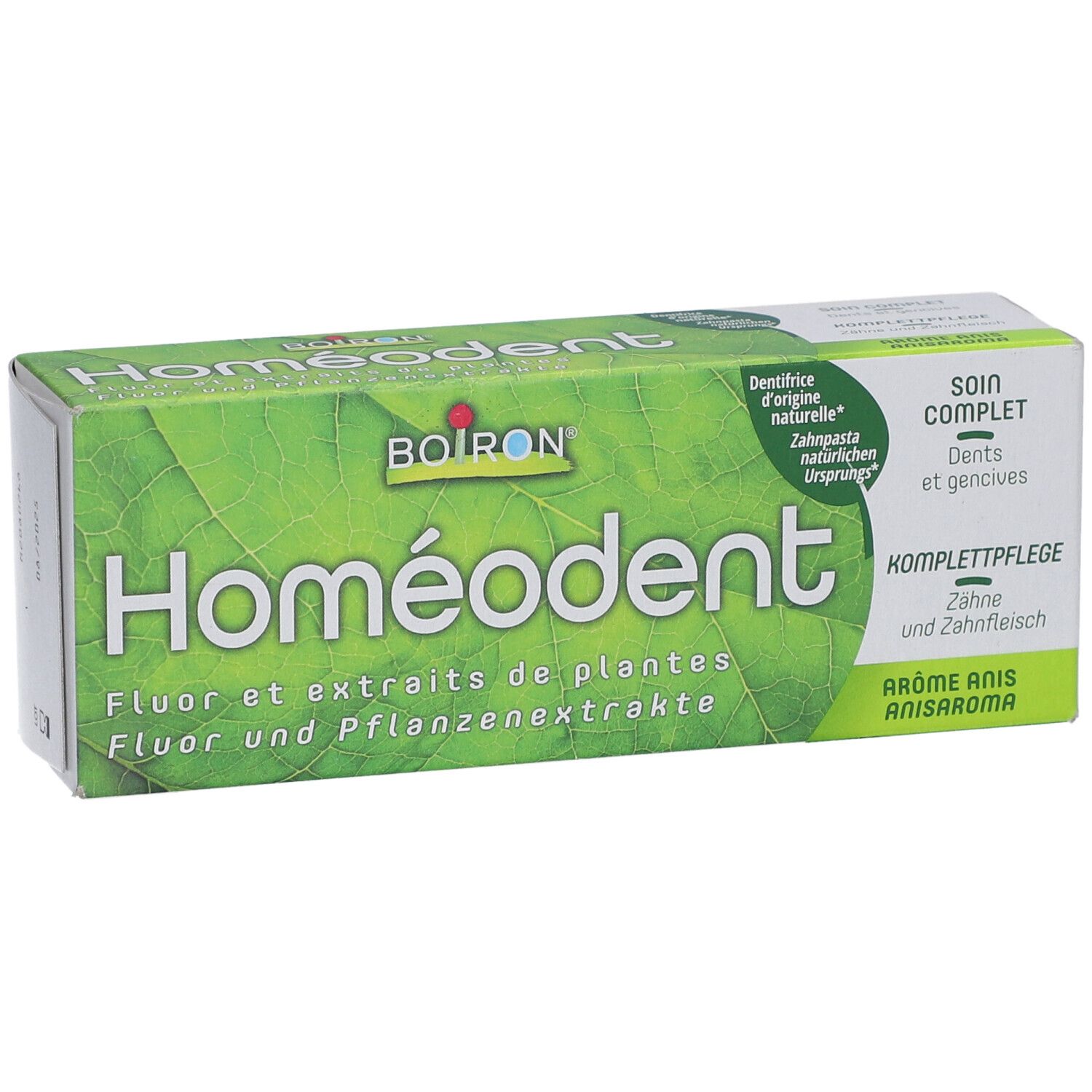 Homeodent Zahnpasta-Schachtel, grüne Farbe. Aufschrift: Fluor und Pflanzenextrakte. Marke: Boiron.