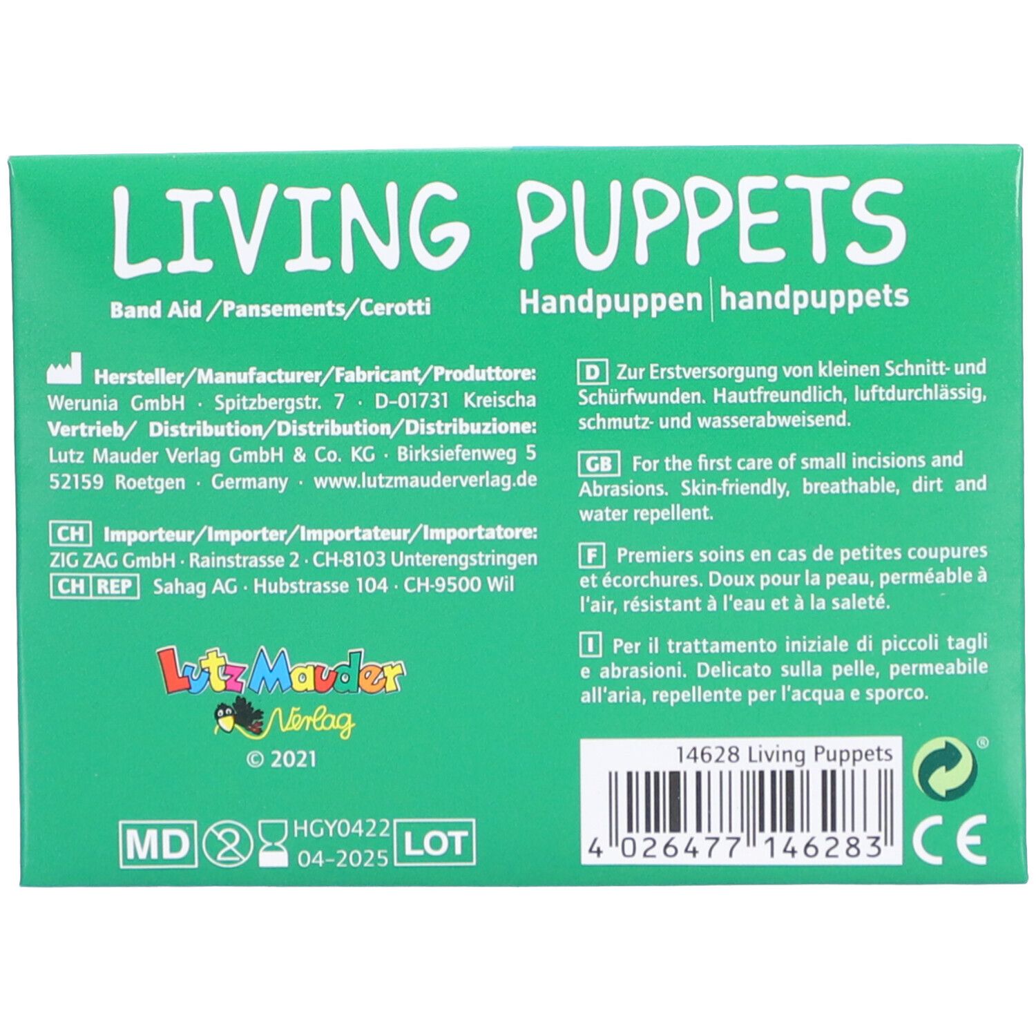 Rückseite der Pflasterverpackung. Text: Living Puppets, Band Aid, Hersteller, Gebrauchsanweisung. Logo: Lutz Mauder Verlag. Barcode und CE-Kennzeichnung.