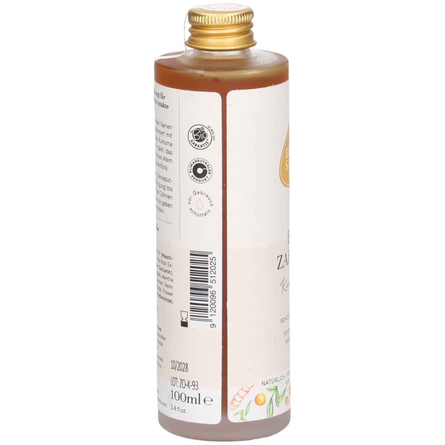 Braune Flüssigkeit in einer zylindrischen Flasche mit goldenem Deckel. Etikett mit Text und Logos. 100ml.