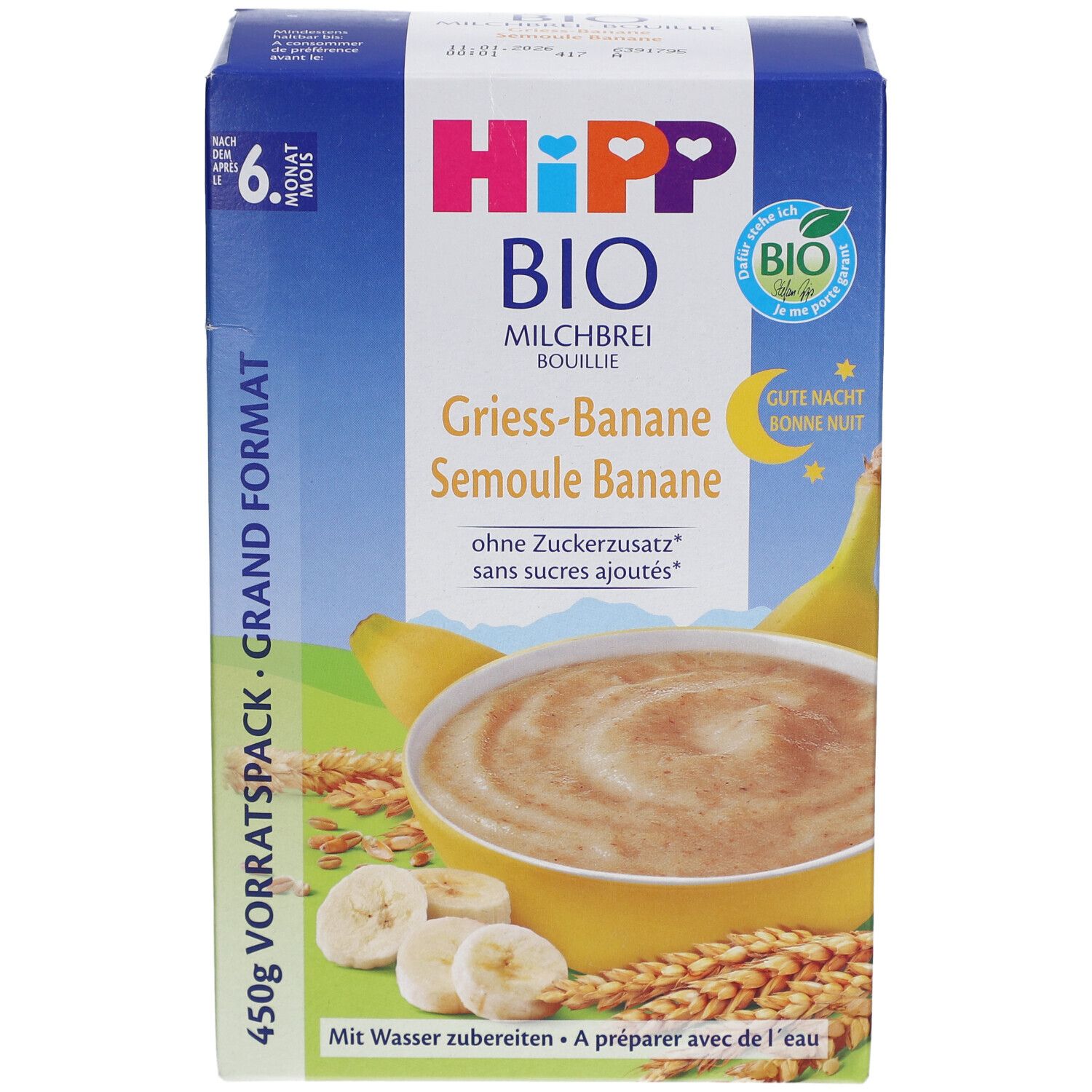 HIPP Bio Milchbrei Grieß Banane Verpackung. Blaue Box mit Produktbild, Logo, und Text. Bio-Siegel und Text "Ab 6 Monaten".