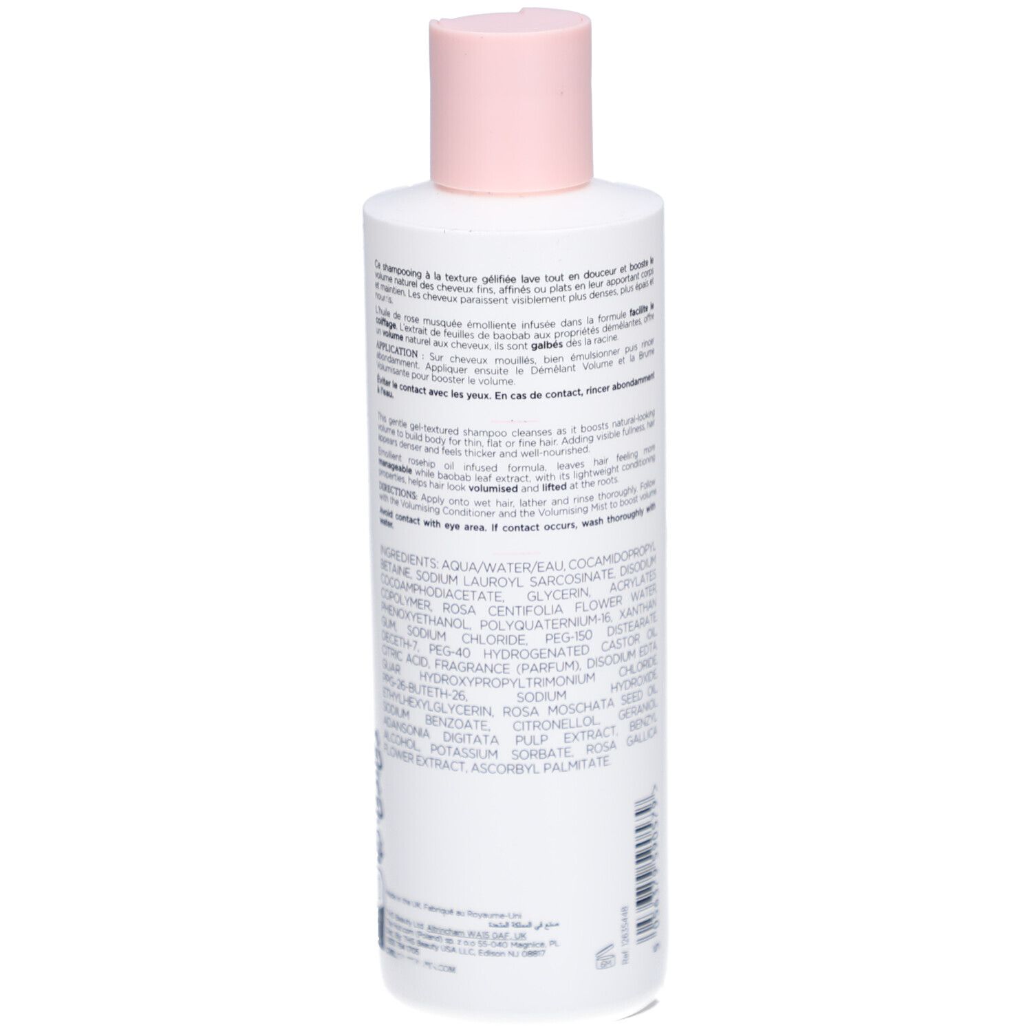 Rückseite der Shampoo-Flasche. Text mit Inhaltsstoffen und Anwendungshinweisen. Weiße Flasche mit rosa Details.