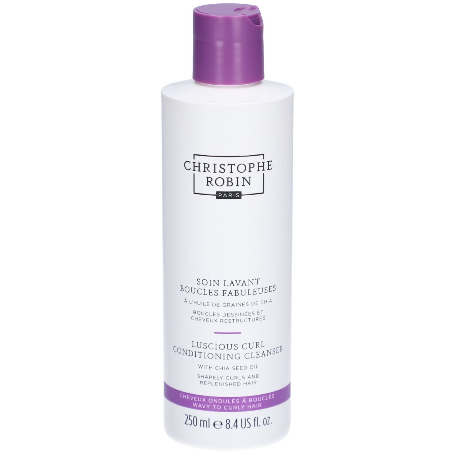Weiße Flasche mit lila Verschluss. Text: Christophe Robin, Soin Lavant Boucles Fabuleuses, Luscious Curl Conditioning Cleanser.