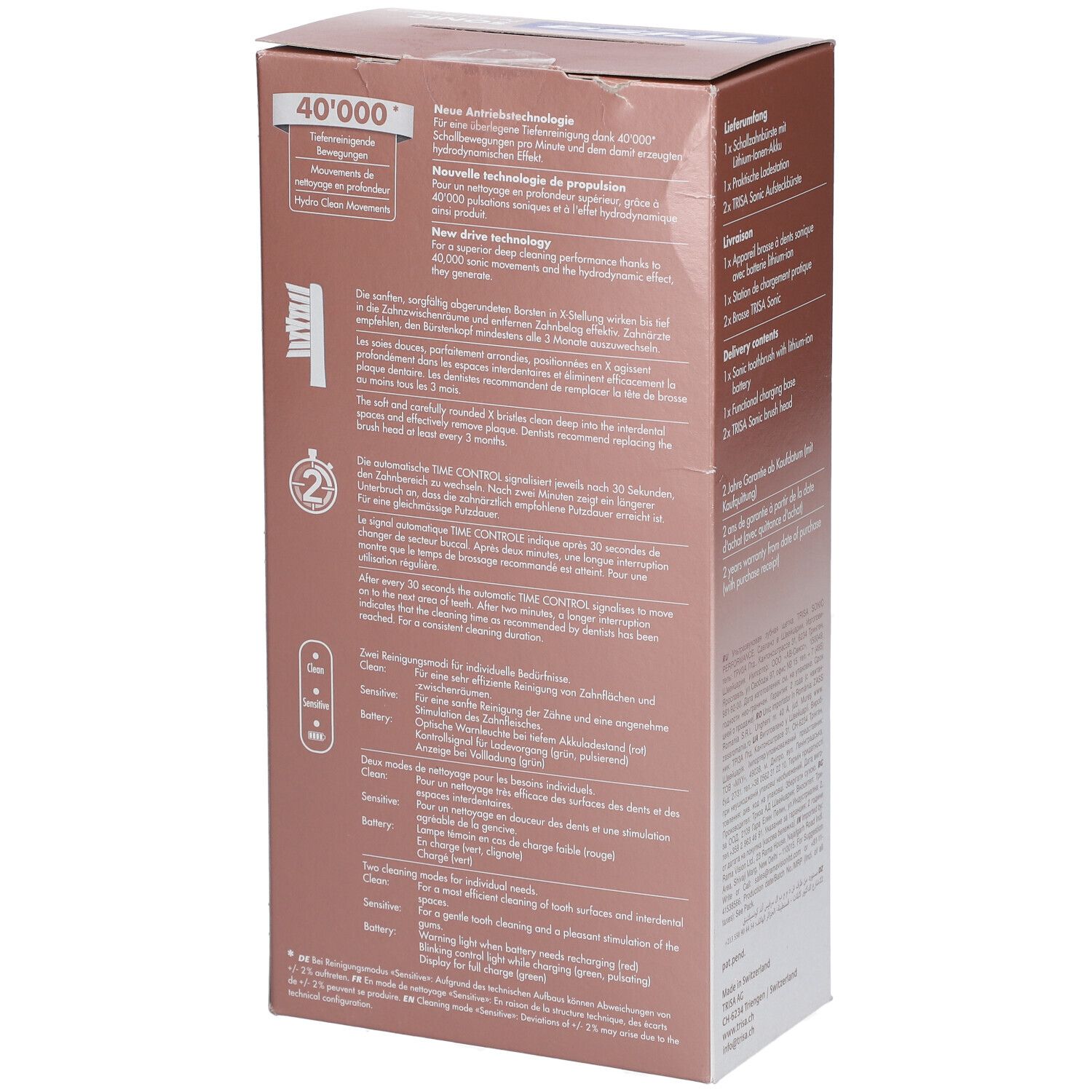 Rückseite der Verpackung mit technischen Details. Marke Trisa, Modell Sonic Performance. Informationen zur Technologie und Modi.