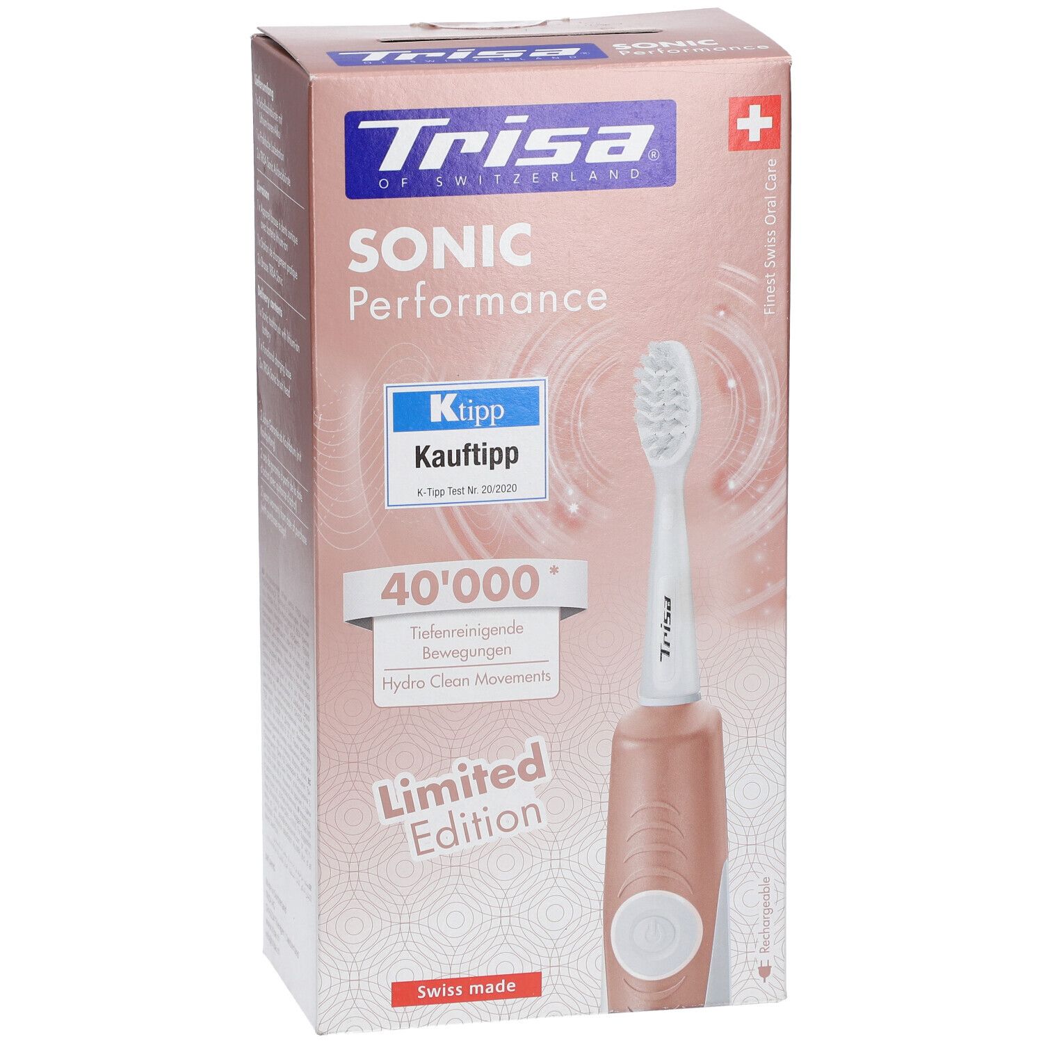 Vorderseite der Verpackung. Elektrische Zahnbürste Trisa Sonic Performance. Rosa-goldene Farbe. Ktipp-Auszeichnung.
