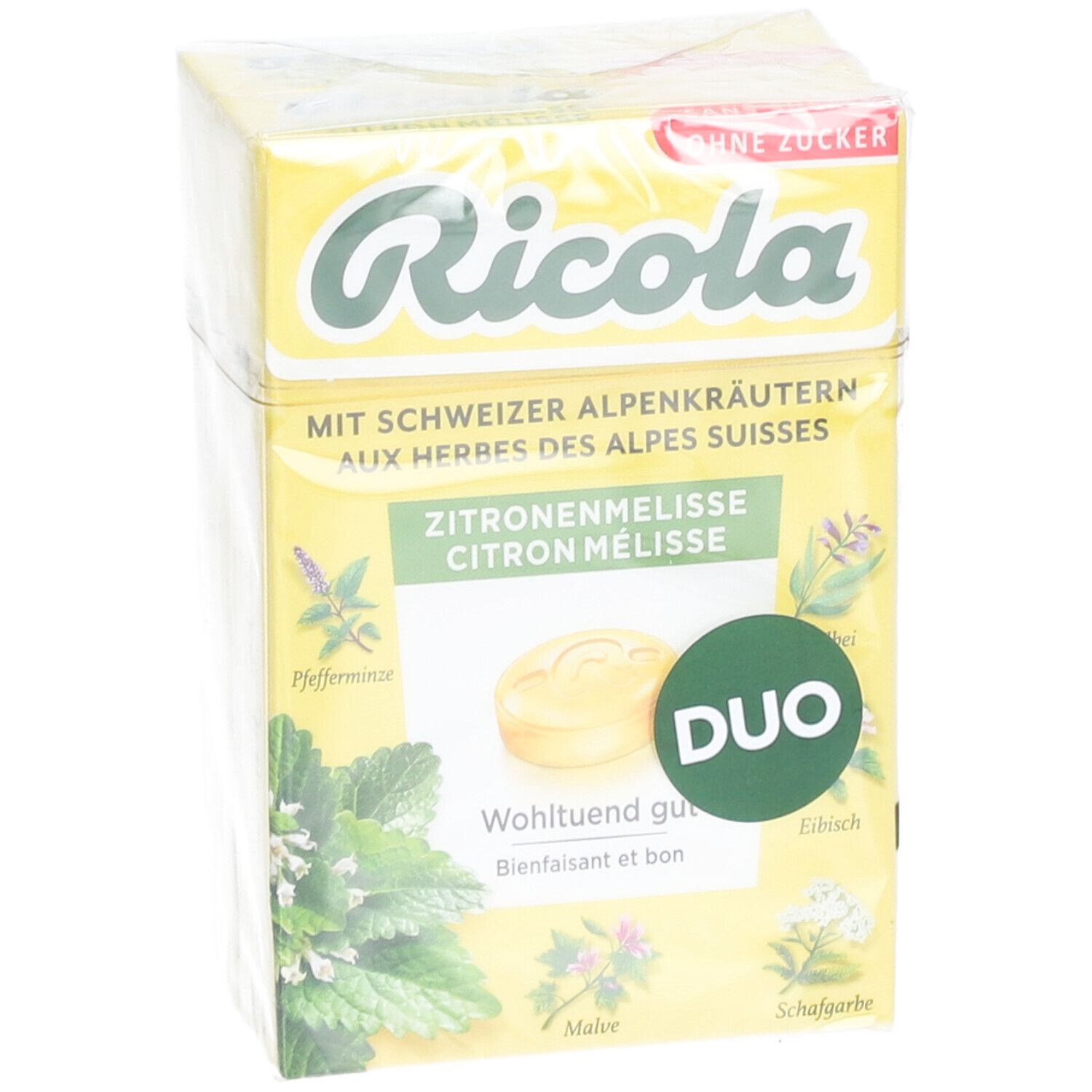 Gelbe Duo-Packung Ricola-Bonbons, in Folie verpackt. Aufdruck: Zitronenmelisse, Kräuter, ohne Zucker. Duo-Logo.