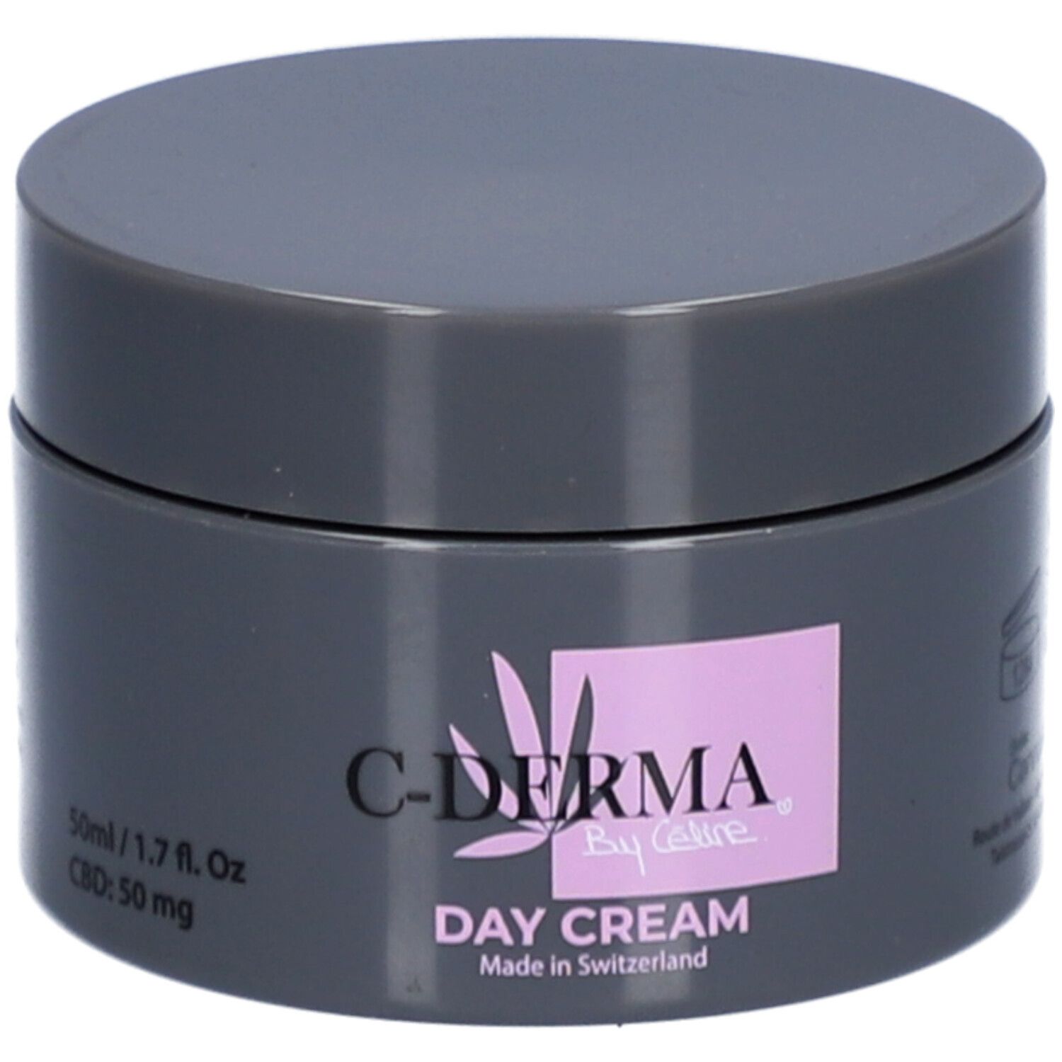 Dunkelgrauer Tiegel mit Deckel. Aufschrift: C-DERMA By Celine, Day Cream. Rosa Feld mit Logo. 50ml/1.7 fl. Oz. CBD: 50 mg.