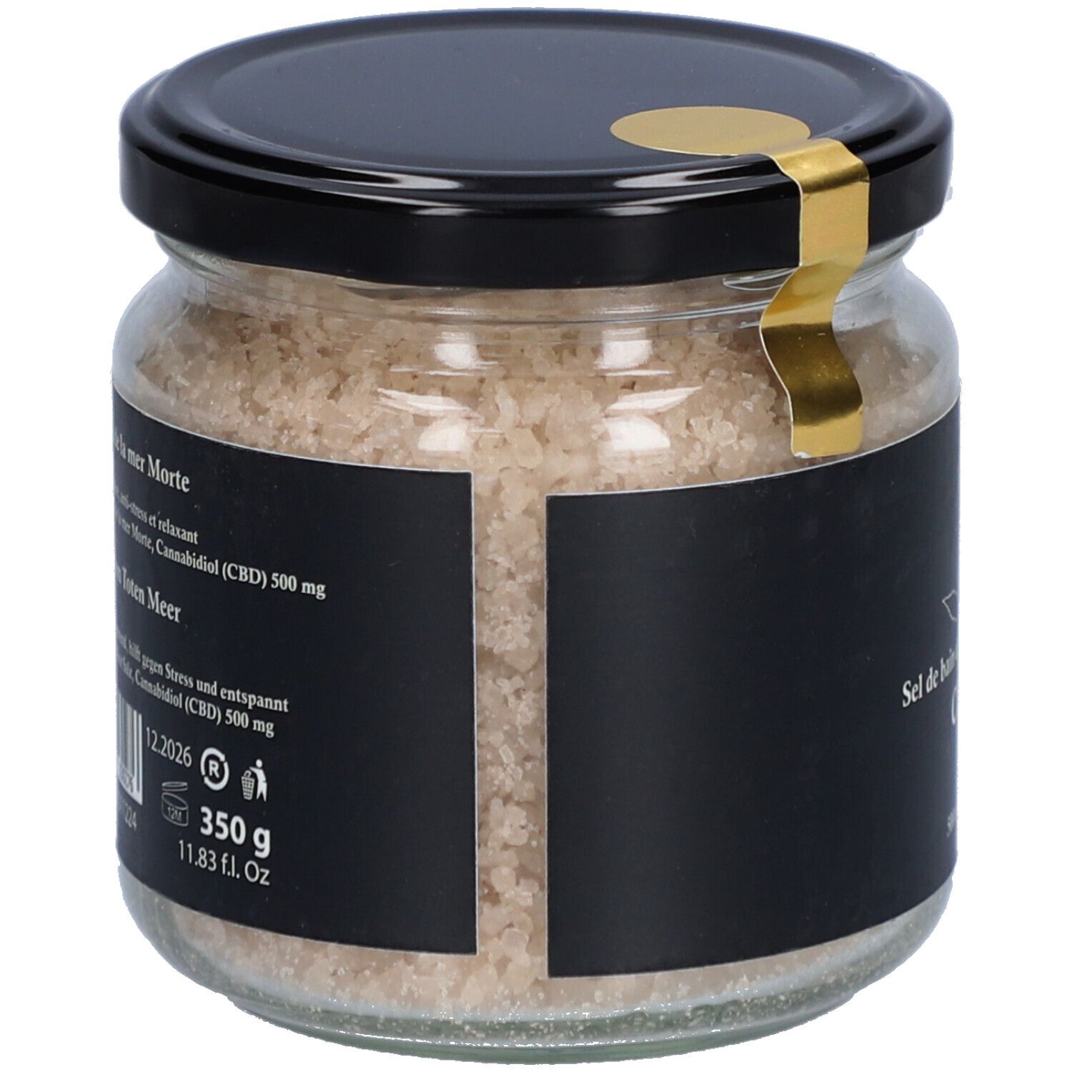 Pot de sel de bain. Étiquette noire avec informations produit. 350 g, 11.83 fl. oz. Couvercle noir avec sceau doré.
