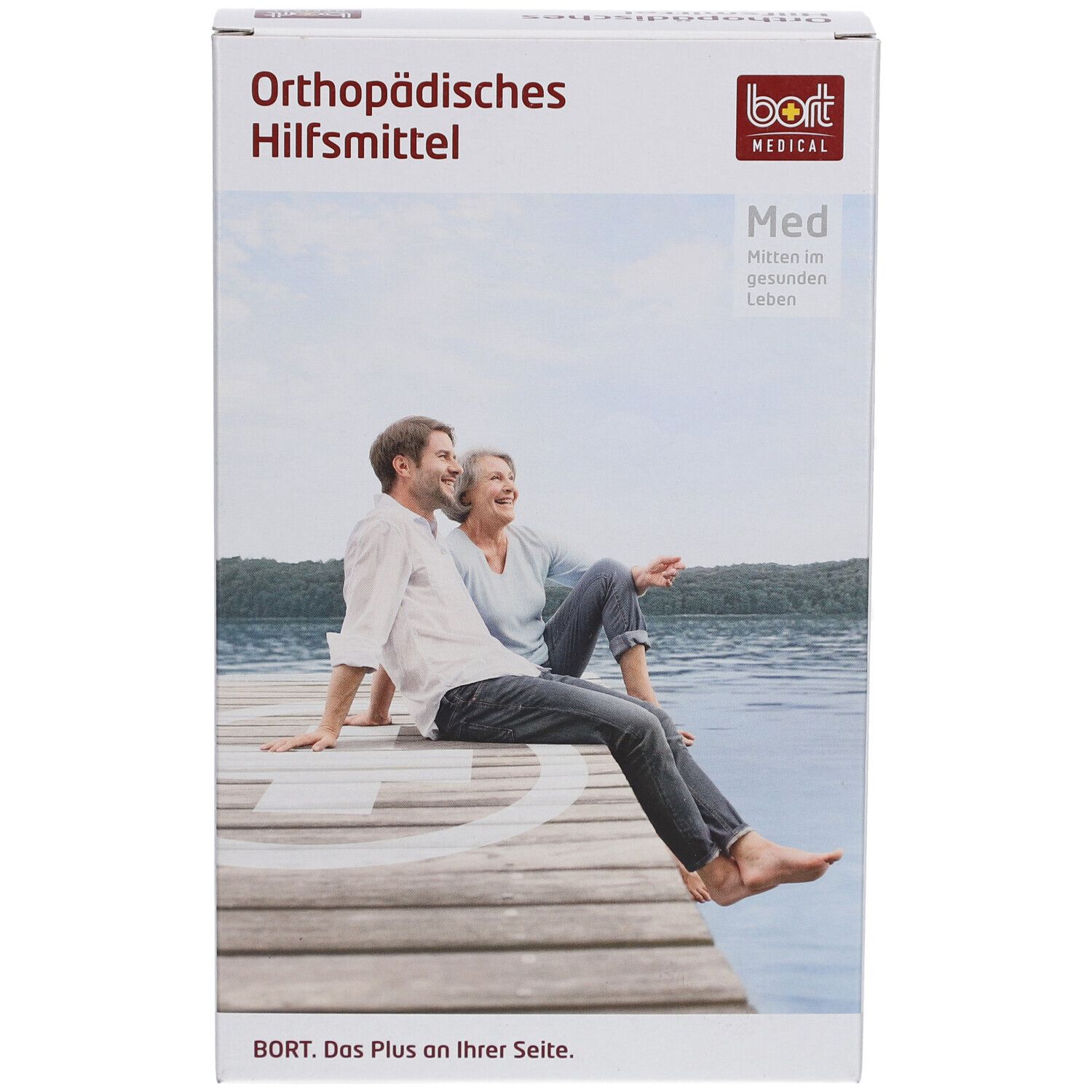 Emballage. Dispositif orthopédique. BORT MEDICAL. Med. Couple assis sur une jetée.