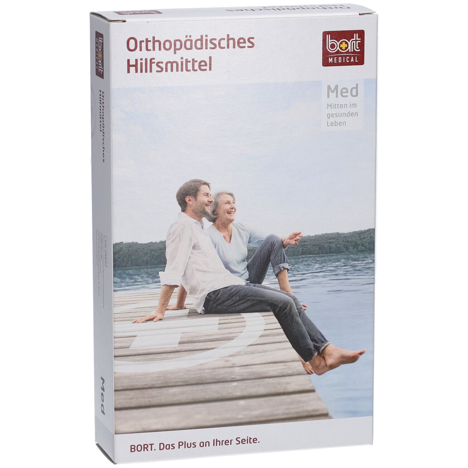 Emballage. Dispositif orthopédique. BORT MEDICAL. Med. Couple assis sur une jetée.