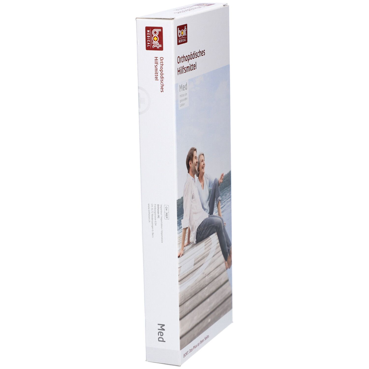 BORT-Verpackung. Orthopädisches Hilfsmittel. Aufdruck: Med. Abbildung: Paar auf Steg am See. Seitenansicht.