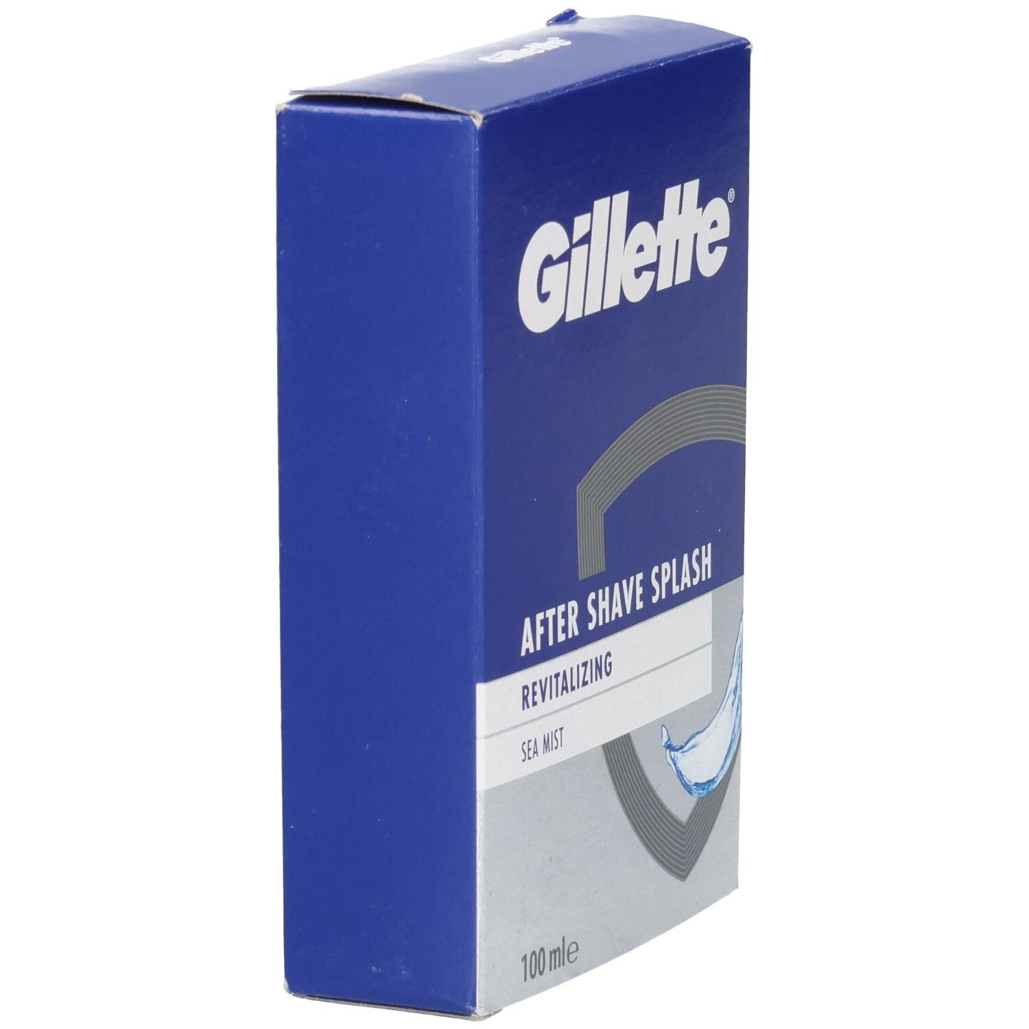 Blaue Schachtel, Gillette-Logo. "AFTER SHAVE SPLASH" und "Sea Mist" auf silbernem Feld. Graue Wellen-Grafik. "100 mle" unten.