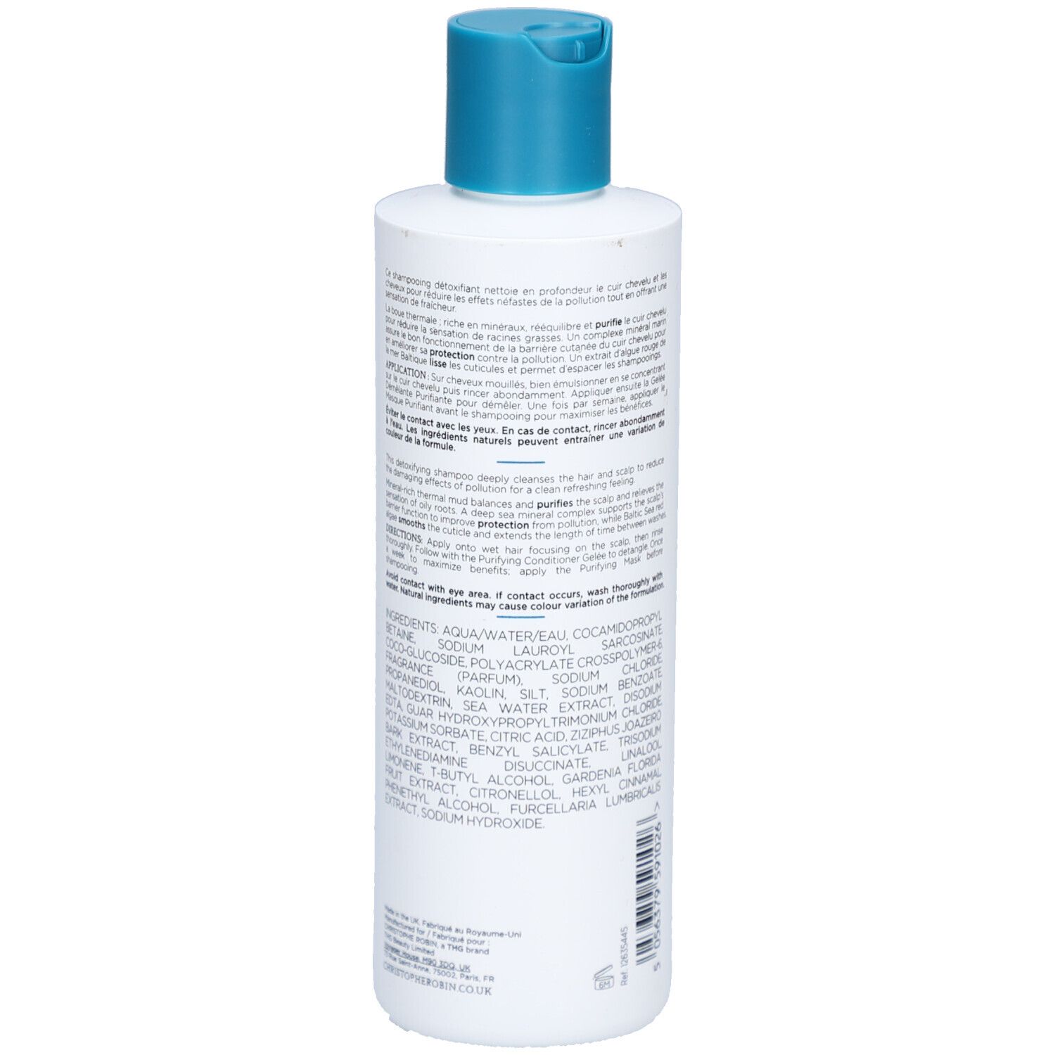Rückseite der weißen Flasche mit blauem Deckel. Text in mehreren Sprachen. Inhaltsstoffe und Anweisungen.