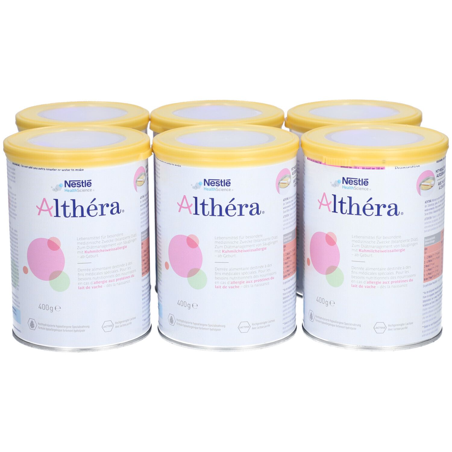 Sechs Dosen mit gelben Deckeln. Aufschrift "Althéra" und "400g". Rosa und grüne Kreise als Designelemente.