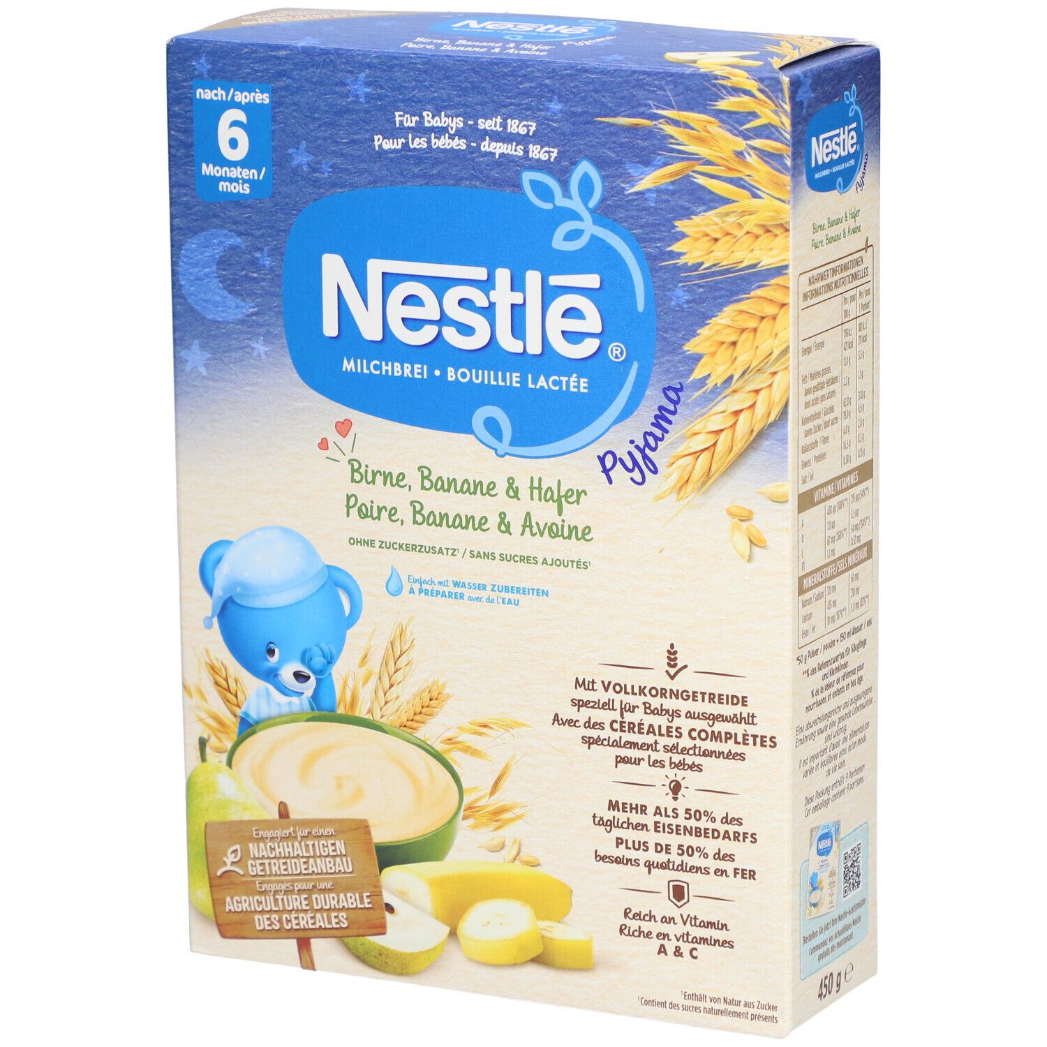 Nestlé Milchbrei-Packung. Blaue Box mit Produktnamen und Illustrationen von Birne, Banane und Hafer. Text: ab 6 Monaten.