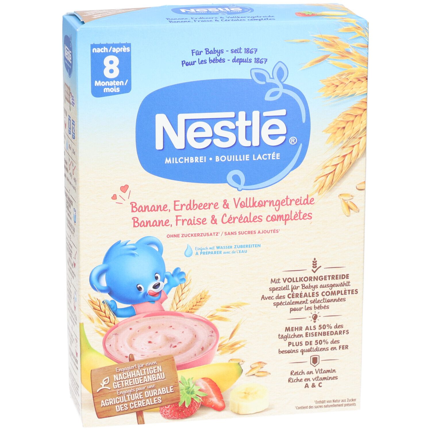 Nestlé Milchbrei Packung. Blaue Verpackung mit Produktnamen und Illustrationen von Früchten und Getreide. Ab 8 Monaten.