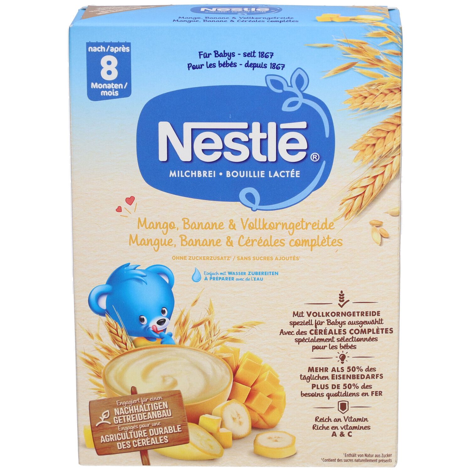 Boîte Nestlé Bouillie Lactée Mangue-Banane. Emballage bleu avec image produit, logo et texte. Contient céréales complètes.