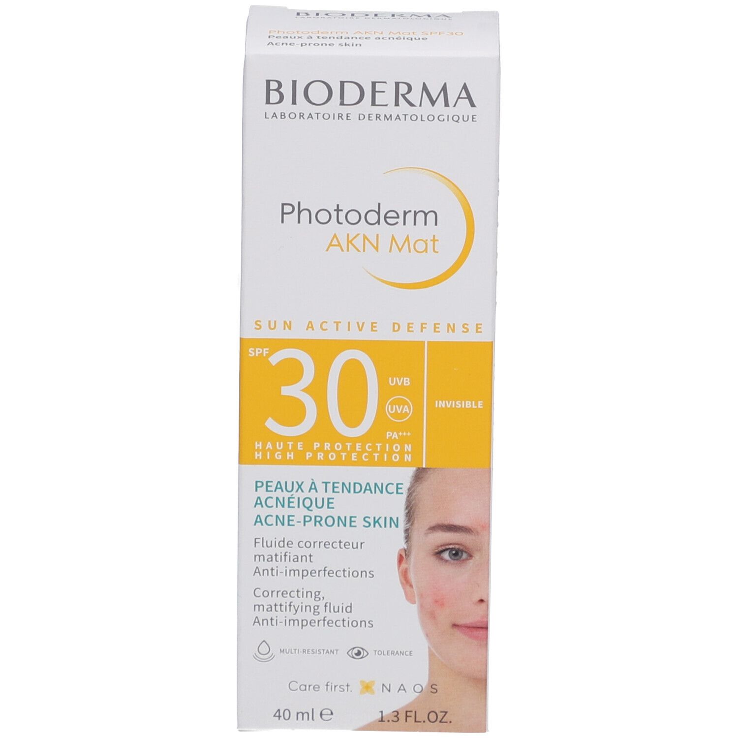 BIODERMA Photoderm AKN Mat SPF30 Verpackung. Gelbe Akzente. 40 ml. Frau mit Hautunreinheiten.