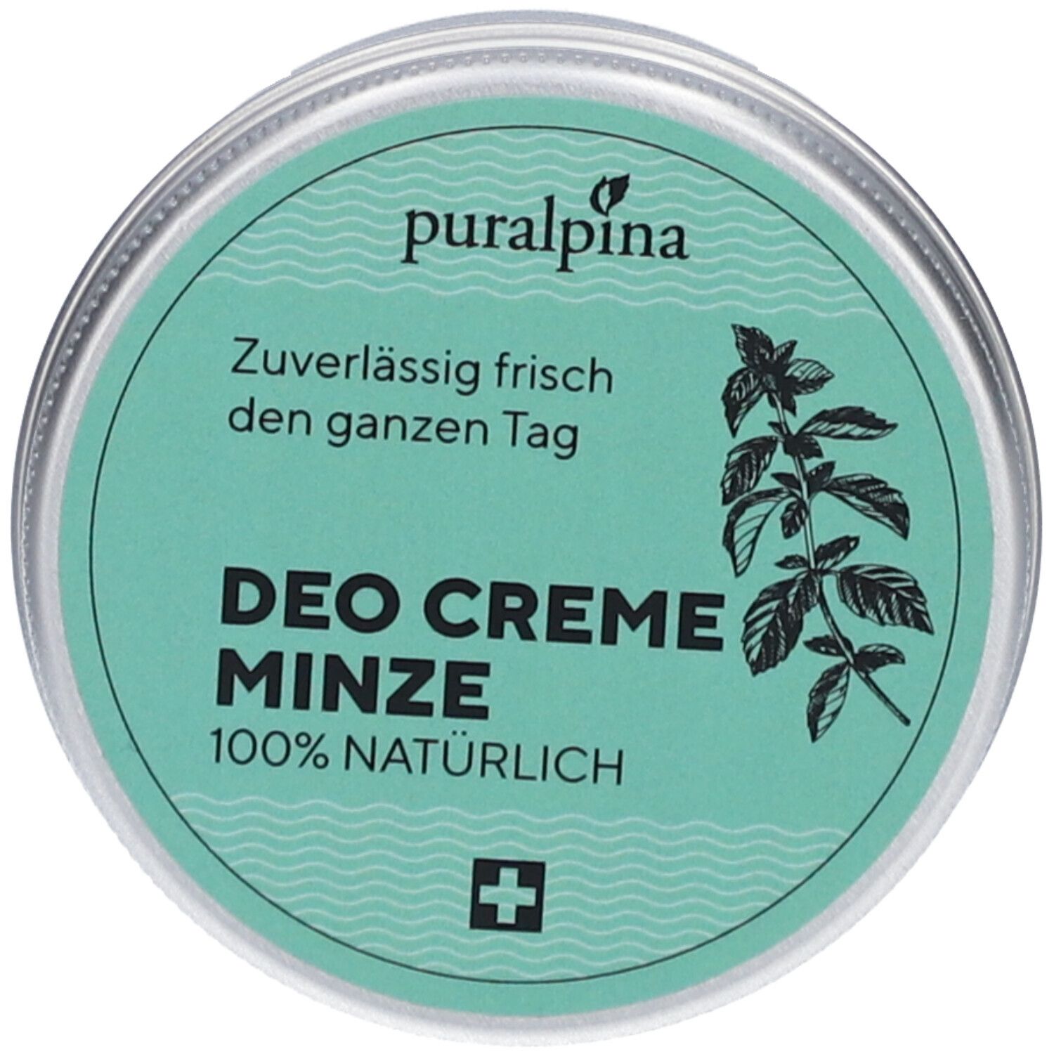 Runde Dose mit grünem Deckel. Aufschrift: Puralpina, Deo Creme Minze, 100% natürlich. Schweizer Kreuz.