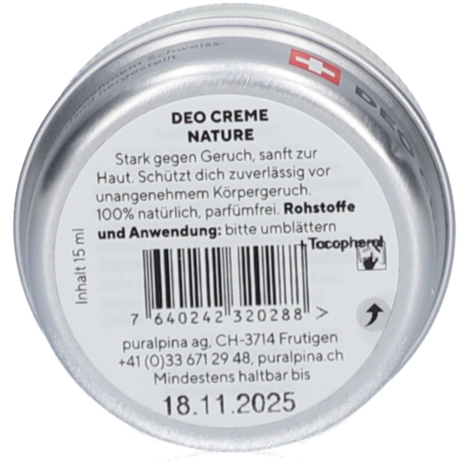Zylindrischer Behälter. Aufschrift: Deo Creme Nature. Barcode. Mindestens haltbar bis 18.11.2025. Schweizer Kreuz.