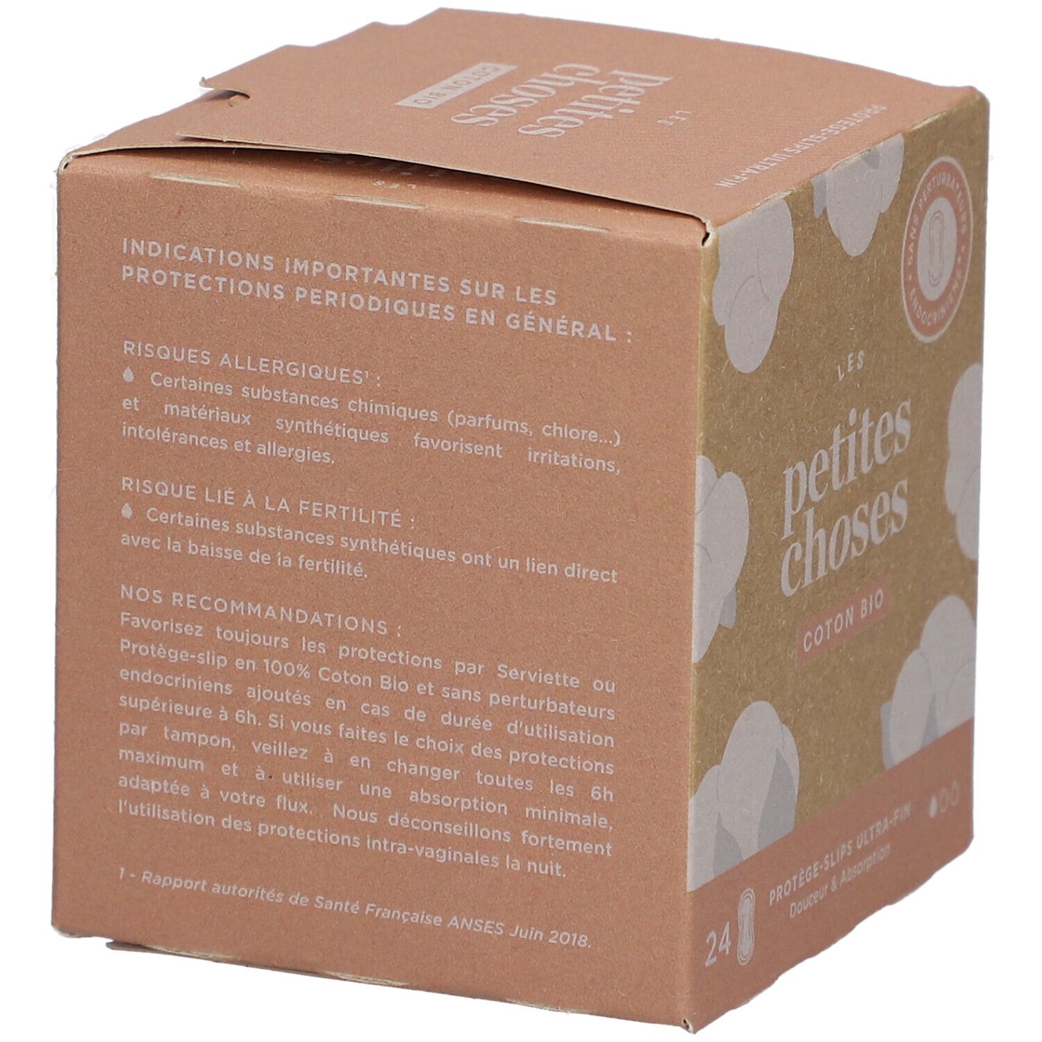 Kartonnen doos met tekst over risico's en aanbevelingen. 'LES PETITES CHOSES' en 'Coton Bio' zijn zichtbaar.