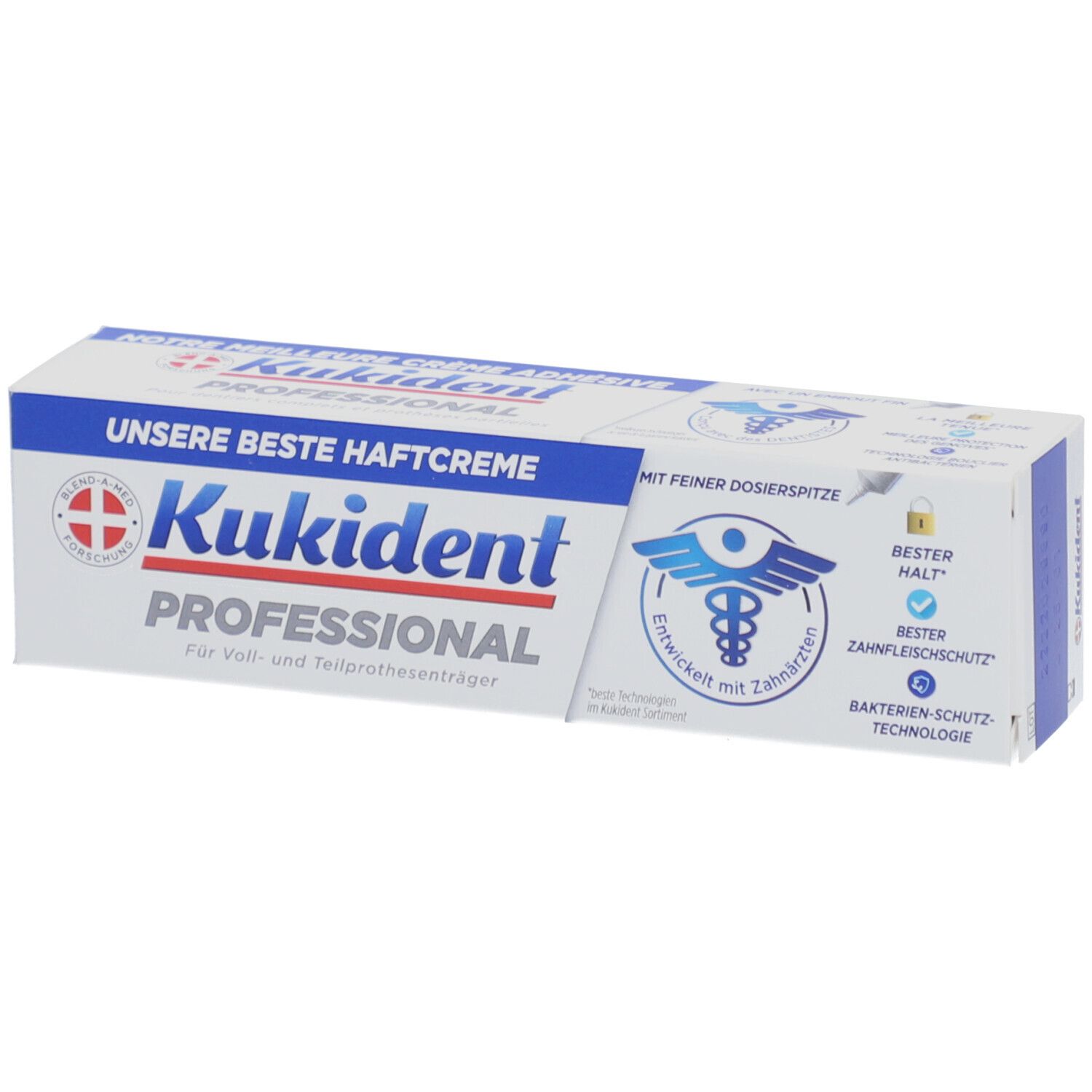 Boîte blanche avec texte bleu. Inscription: Kukident Professional, notre meilleure crème adhésive. Logo avec symbole dentaire.