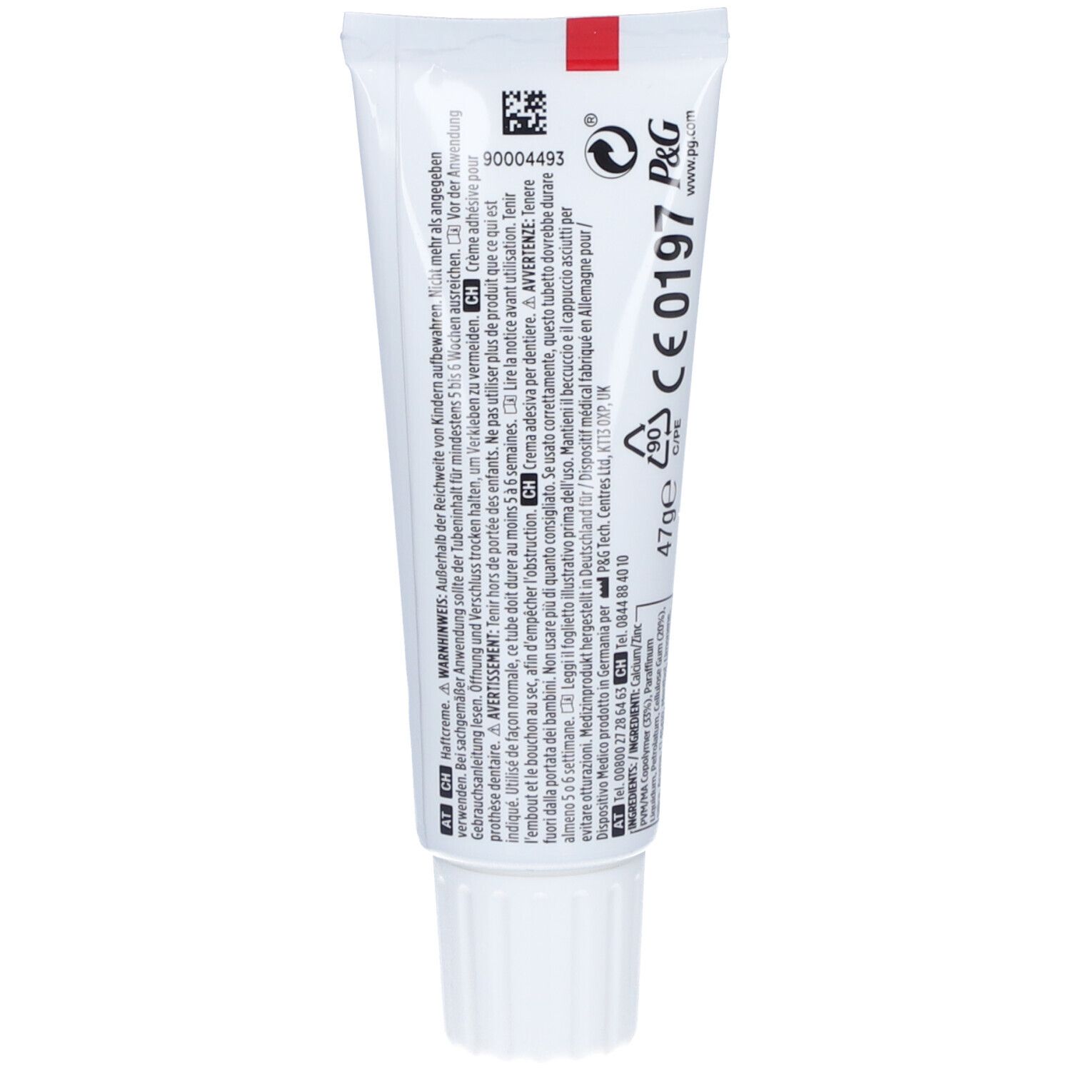 Dos du tube de crème adhésive pour prothèses dentaires. Texte et symboles. Informations du fabricant. Marquage CE. 47g.