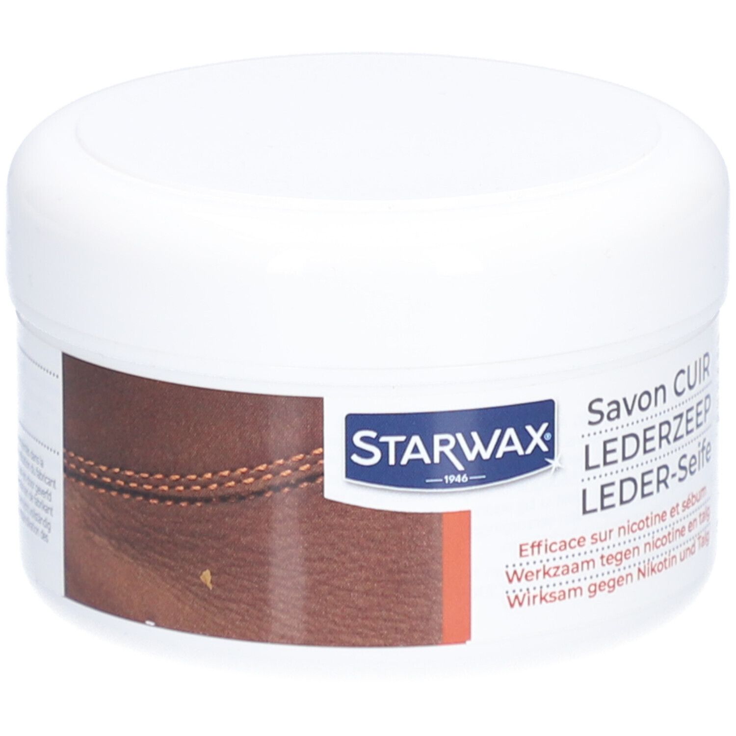 Witte pot met deksel. Opschrift STARWAX, Lederzeep. Bruin leder detail. Tekst: Werkzaam tegen nicotine en talg.