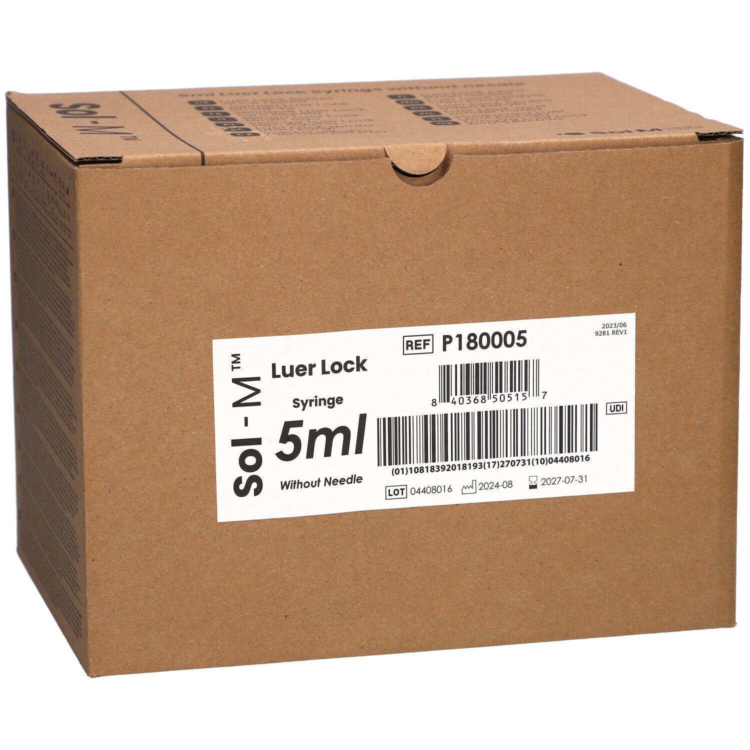Karton mit Sol-M® Spritzen. Aufkleber mit Produktinformationen: Luer Lock, 5 ml, ohne Nadel.