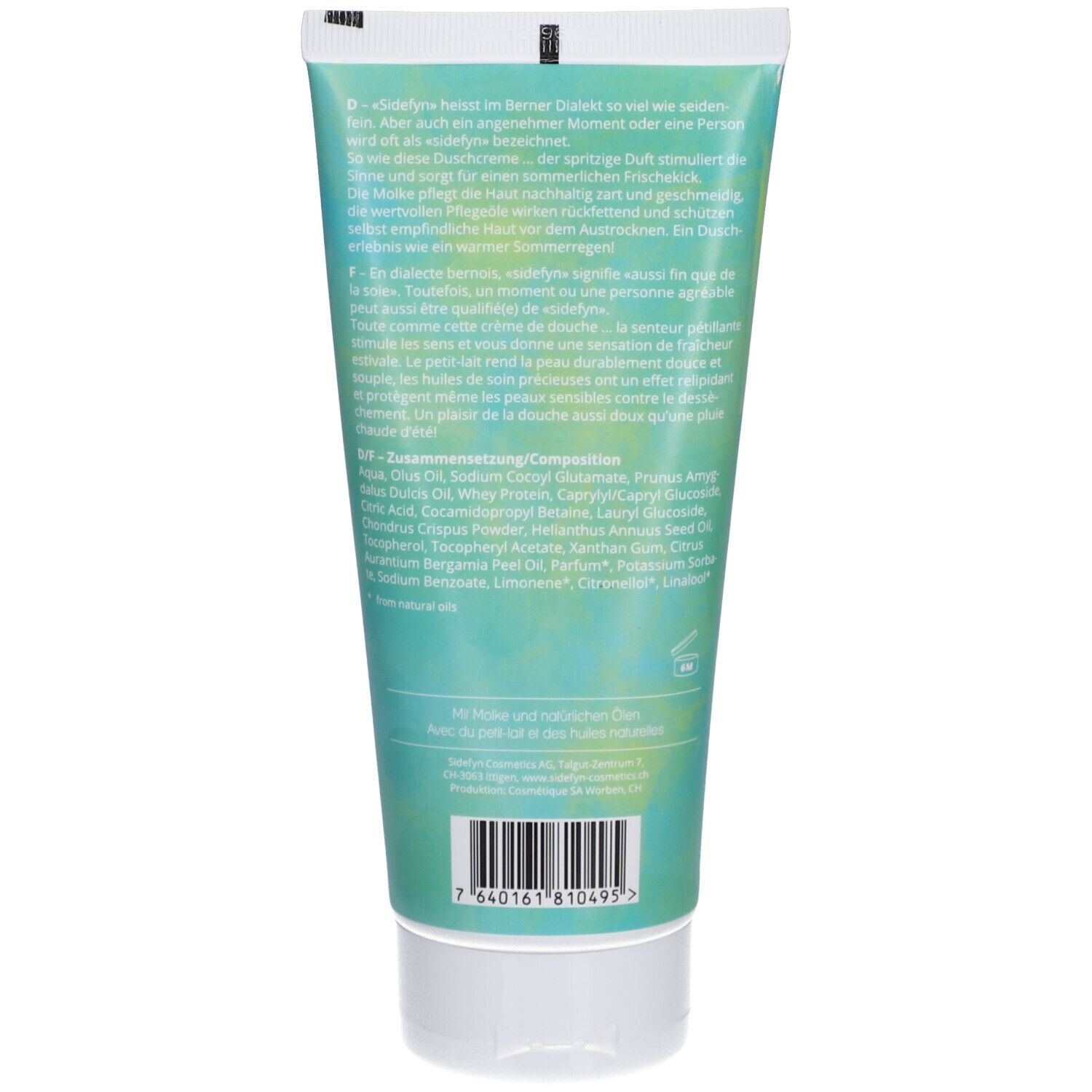Rückseite der Tube. Text in Deutsch, Französisch und Englisch. Barcode unten. Grüner und türkiser Farbverlauf.