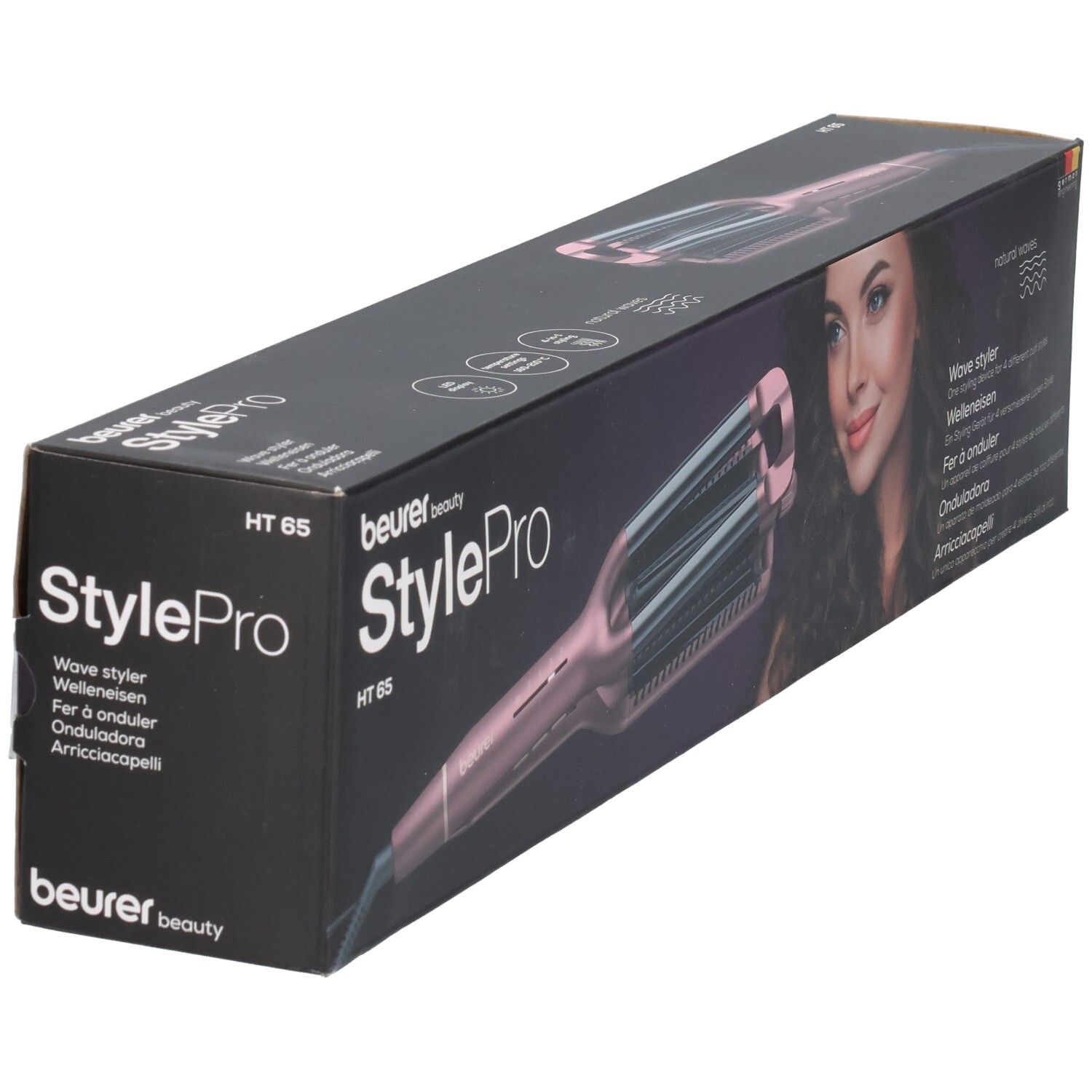 Beurer StylePro HT 65 Welleneisen in Verpackung. Rosa Gerät mit Wellenplatten. Aufdrucke: Wave Styler, HT 65.