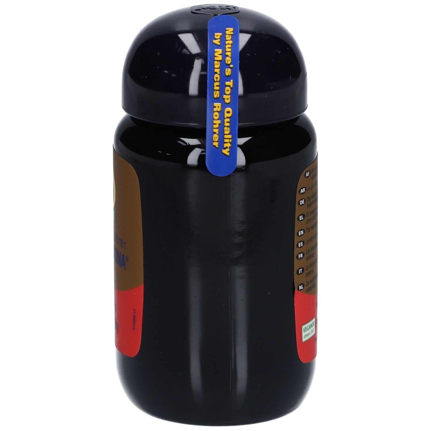 Flacon noir avec bouchon noir. Inscription: Marcus Rohrer Astaxantina. Label: Vegan. Autocollant: Nature's Top Quality.