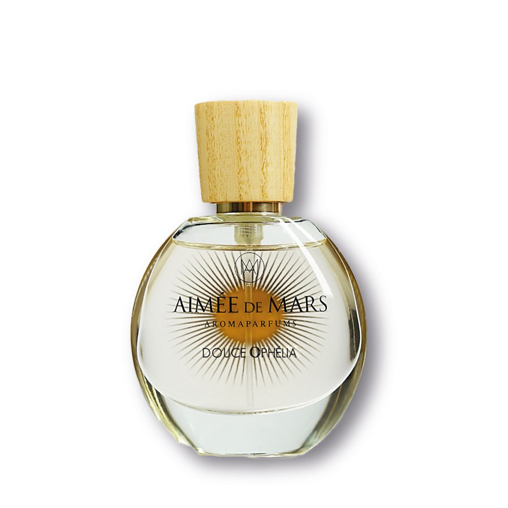 Runde Glasflasche mit Holzverschluss. Aufschrift: Aimée de Mars, Douce Ophélia. Goldfarbene Details.