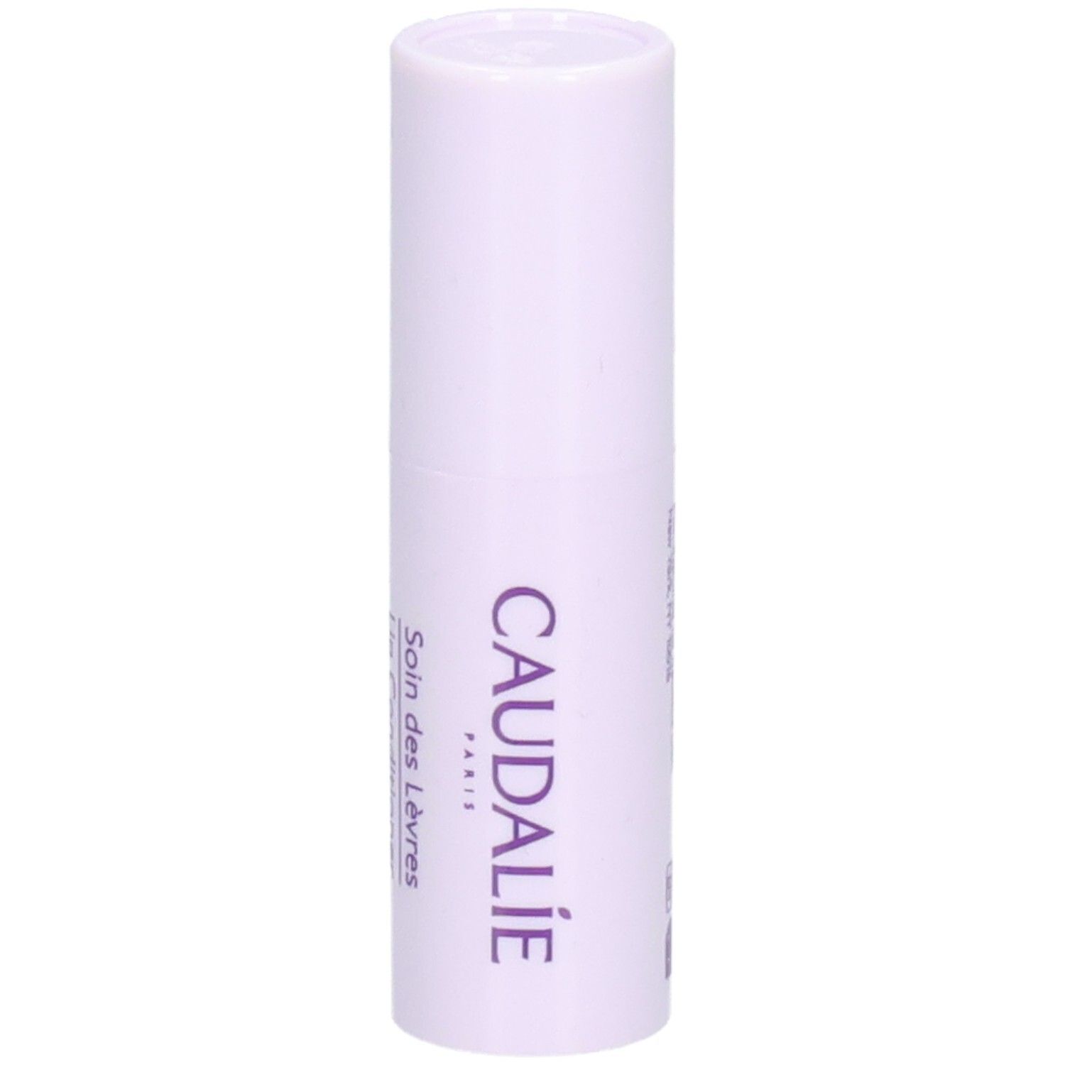 Stick à lèvres en étui blanc-violet. Inscription CAUDALIE PARIS. Texte: Soin des Lèvres.