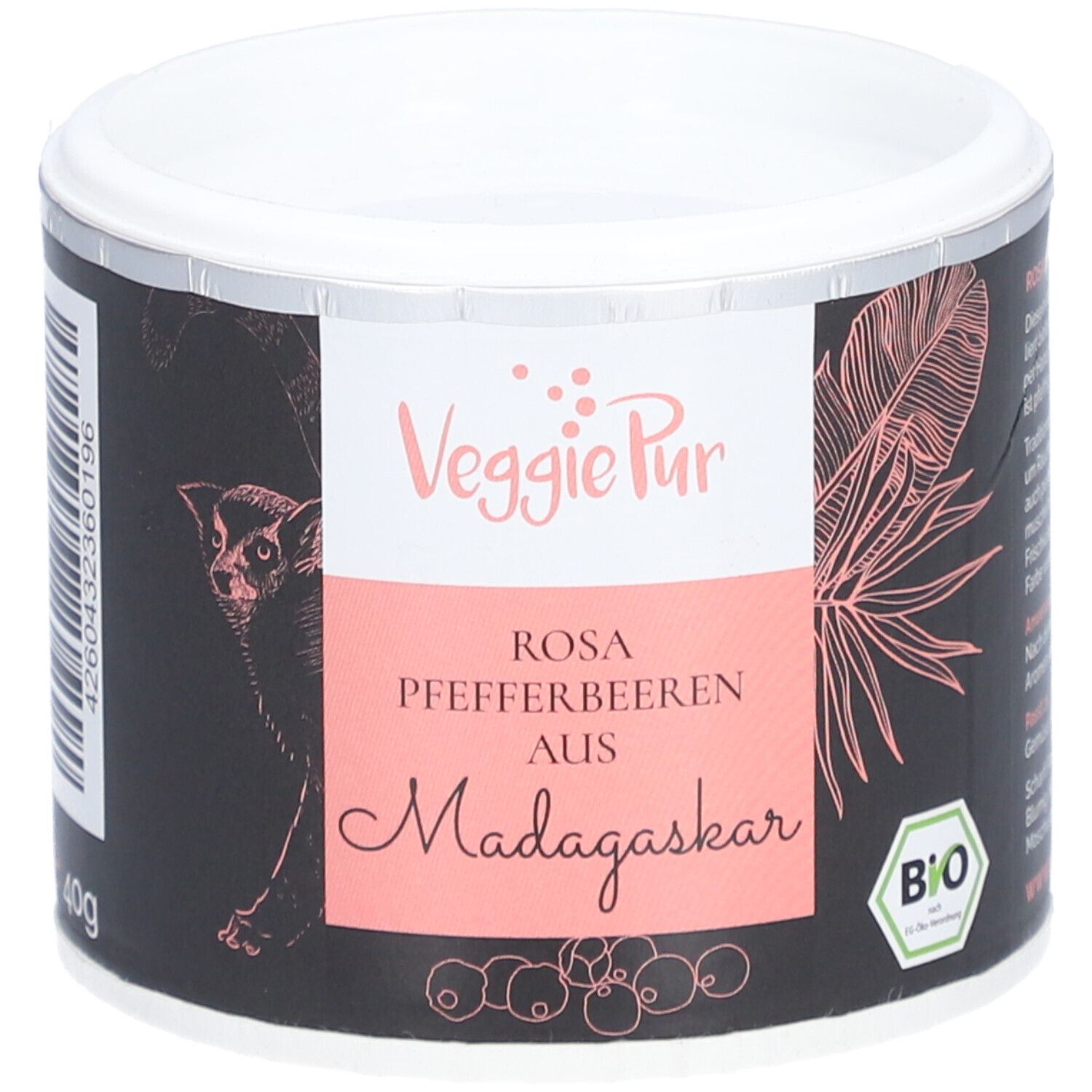 Runde Dose mit VEGGIEPUR-Etikett. Rosa Pfefferbeeren aus Madagaskar. Bio-Siegel. Schwarzer Hintergrund.
