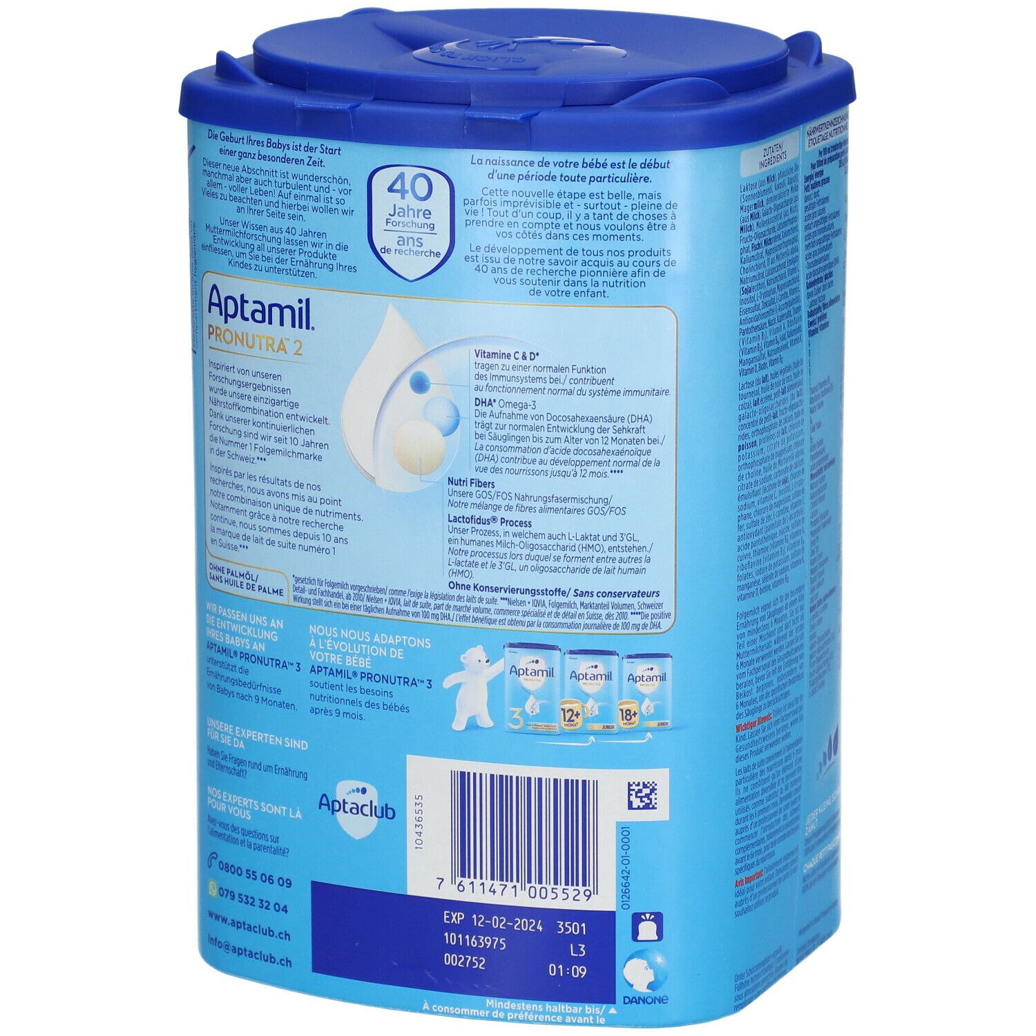 Aptamil Pronutra 2 Dose, Rückseite. Text über die Entwicklung des Babys. Blaue Dose mit Deckel. 800g. Text in Deutsch.