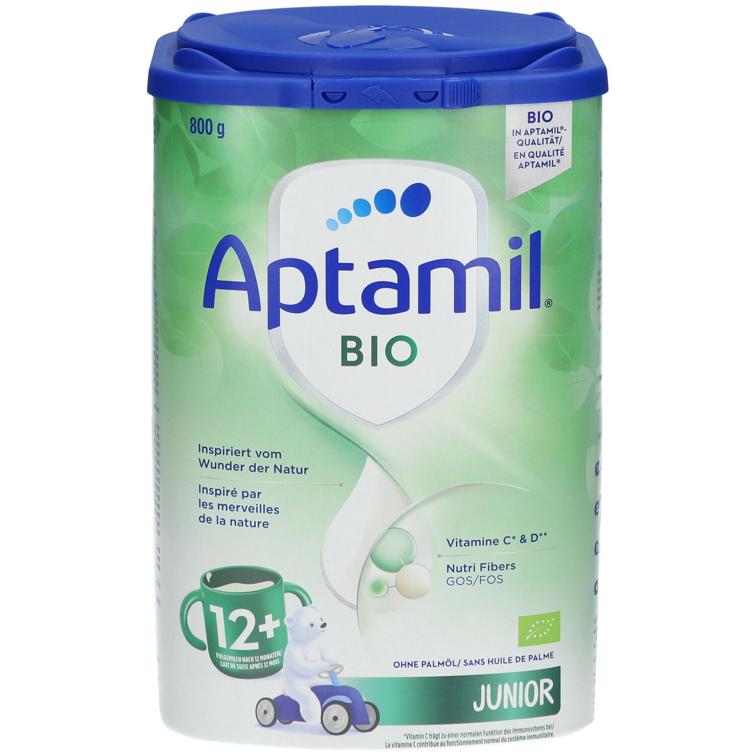 Boîte Aptamil Bio Junior 12+. Verte et blanche, couvercle bleu. Contient Vitamine C & D, Nutri Fibers GOS/FOS. Qualité bio.