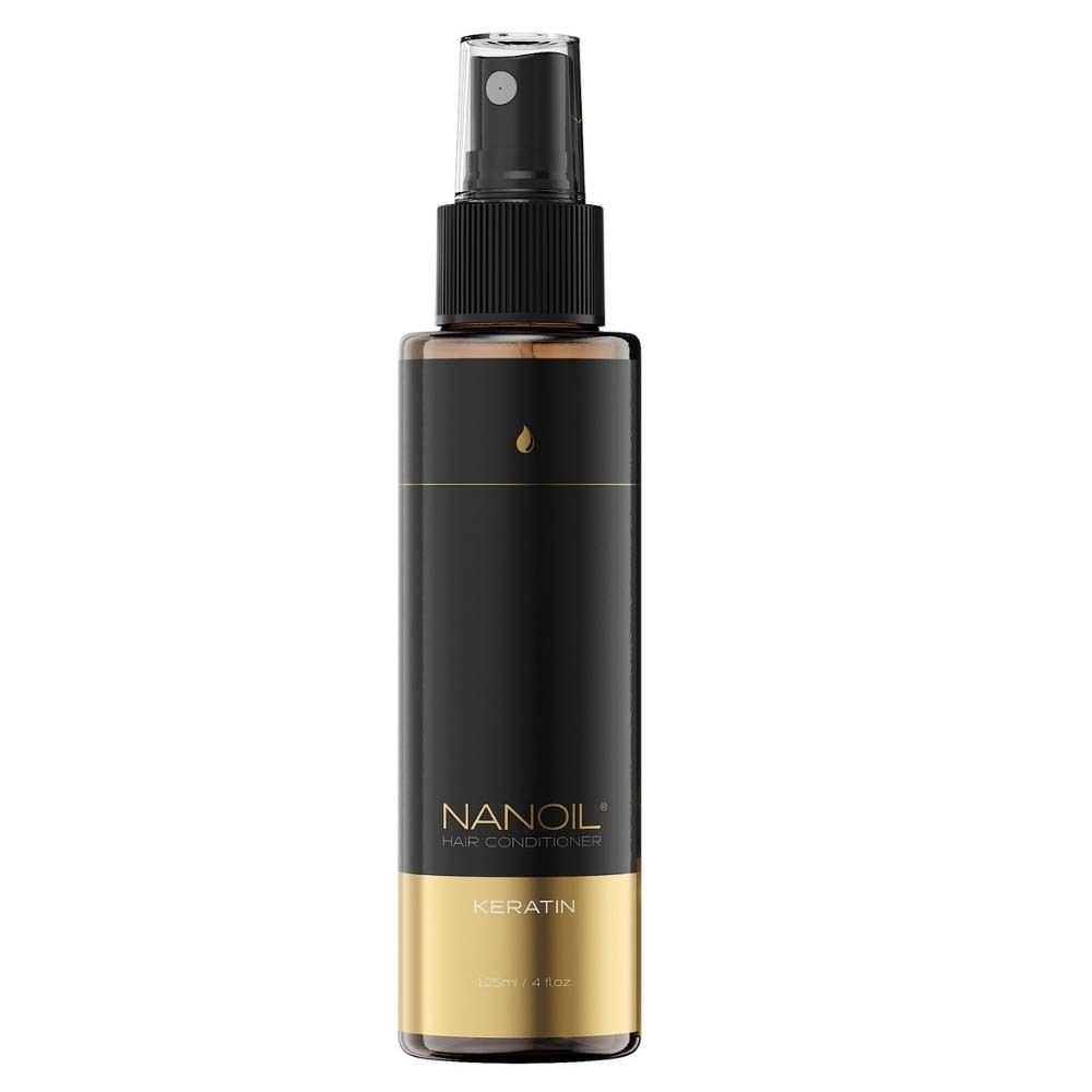 NANOIL® Keratin Haarspülung. Schwarze Flasche mit Sprühkopf und goldener Basis.