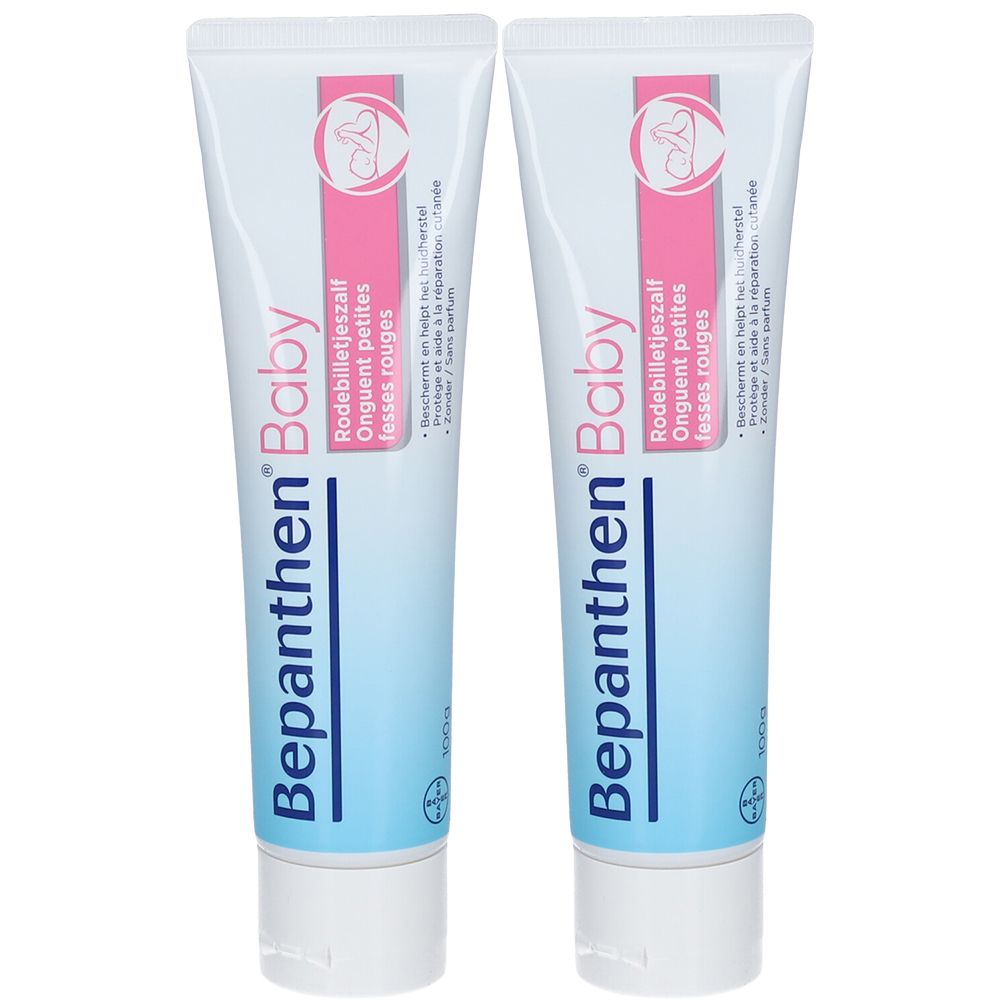 Zwei Tuben Bepanthen Baby Wundcreme. Weiße Tuben mit rosa und hellblauen Akzenten. Aufschrift: Rodebilletjeszalf, Onguent petites fesses rouges.