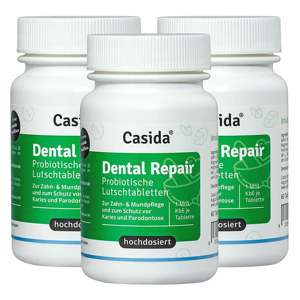 Drei weiße Flaschen mit Schraubverschluss. Auf jeder Flasche steht "Casida Dental Repair". Grüne Etiketten mit Text.