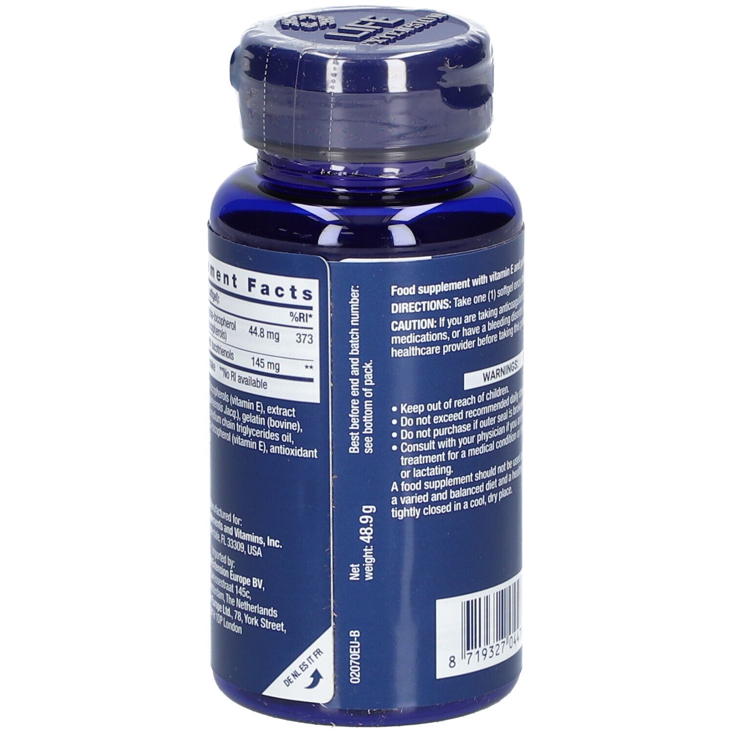 Dos du flacon bleu. Texte: Informations nutritionnelles, ingrédients, poids 46,9 g, numéro de lot, code-barres.