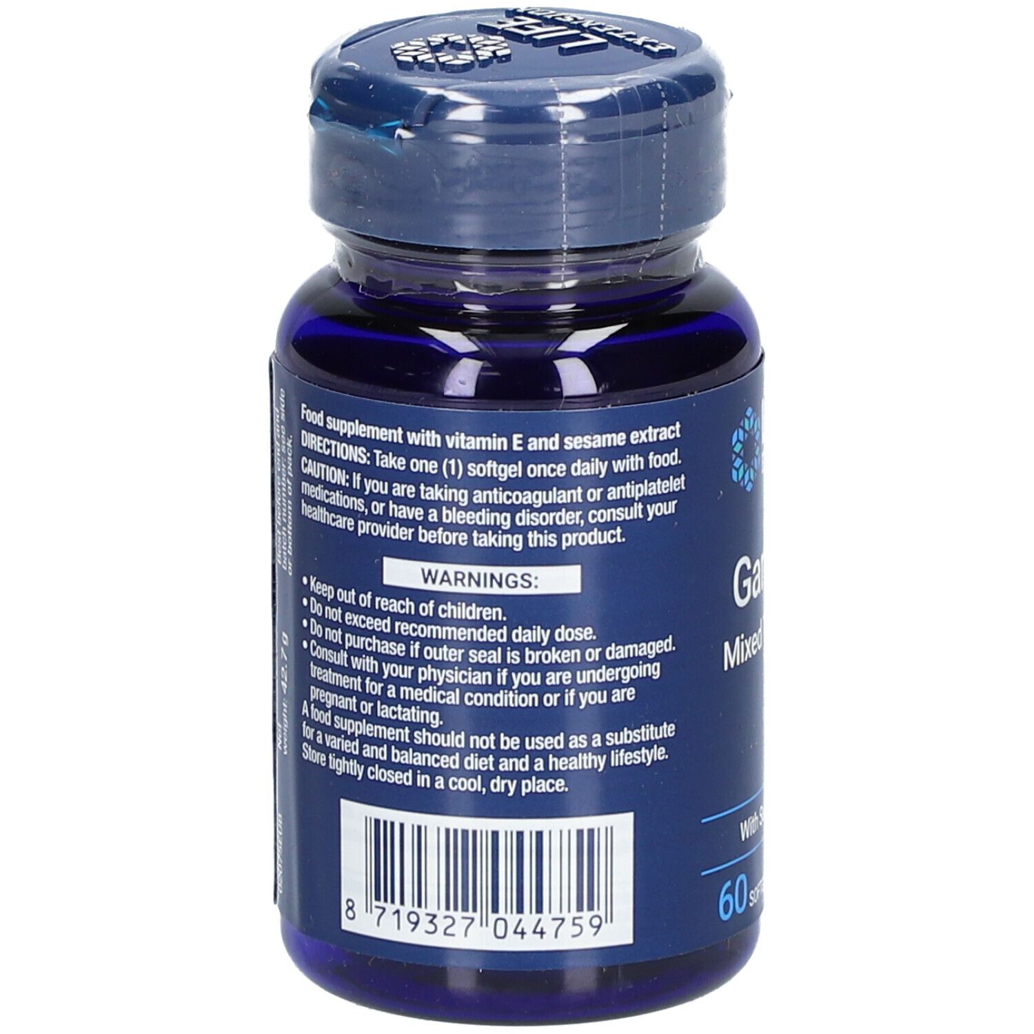 Dos du flacon bleu. Texte : Complément alimentaire avec vitamine E et extrait de sésame. Avertissements et ingrédients.