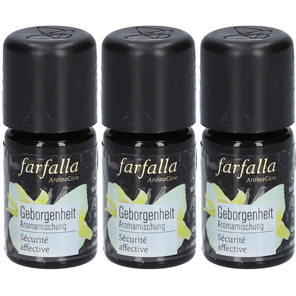 Drei kleine Flaschen mit schwarzem Deckel. Auf den Etiketten steht "farfalla Aromamischung Geborgenheit Sécurité affective".