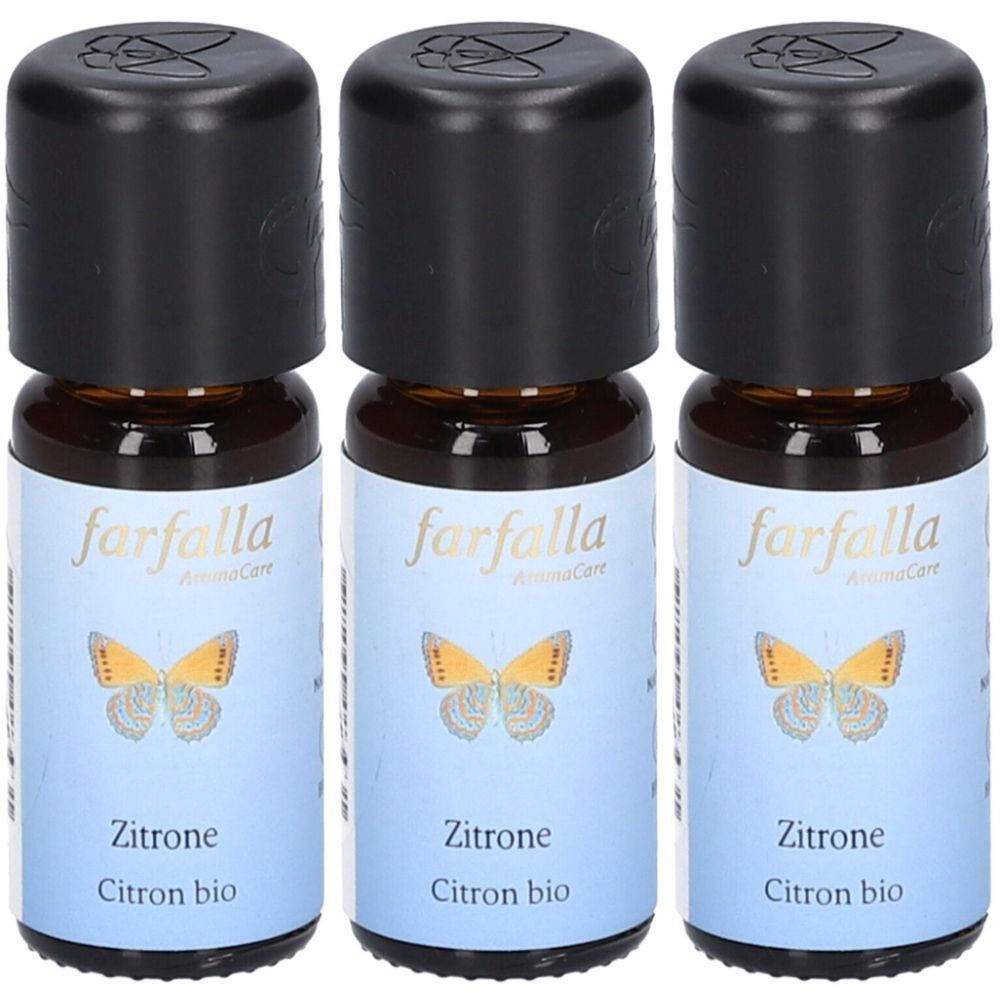 Drei kleine braune Glasflaschen mit schwarzen Deckeln. Auf den Etiketten steht "farfalla", "Zitrone" und "Citron bio".